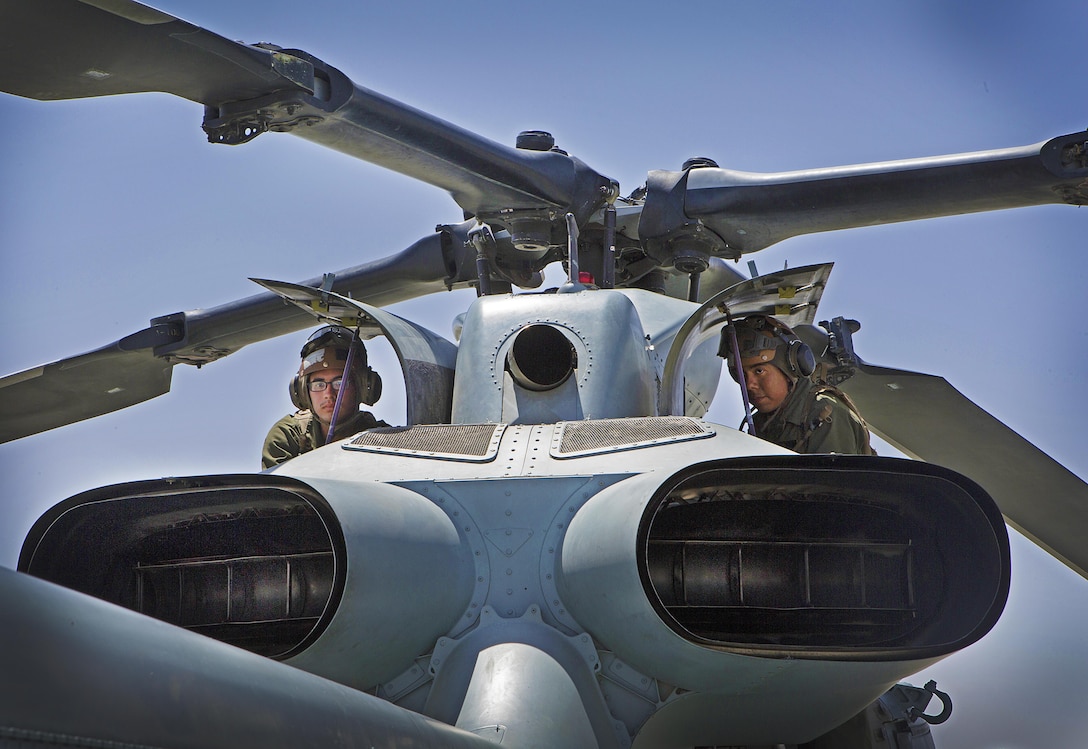Marines with Marine Light Attack Helicopter Squadron (HMLA) 469 conduct maintenance on a UH-1Y Venom during Integrated Training Exercise (ITX) 3-17 at Marine Corps Air Ground Combat Center Twentynine Palms, Calif., May 17. ITX is a combined-arms exercise enabling Marines across 3rd Marine Aircraft Wing to operate as an aviation combat element integrated with ground and logistics combat elements as a Marine air-ground task force. More than 650 Marines and 27 aircraft with 3rd MAW are supporting ITX 3-17. (U.S. Marine Corps photo by Lance Cpl. Becky L. Calhoun/Released)