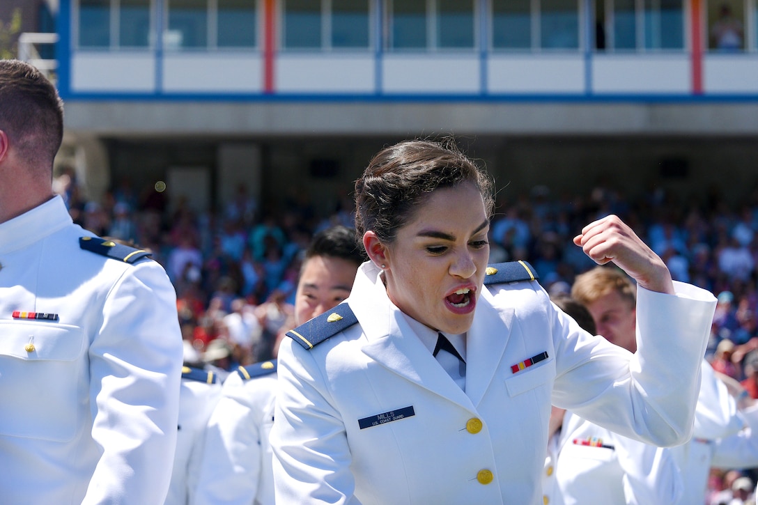 Graduates from the Coast Guard Academy celebrate during the 136th Coast Guard Academy commencement in New London, Conn., May 17, 2017. Coast Guard photo by Petty Officer 2nd Class Patrick Kelley