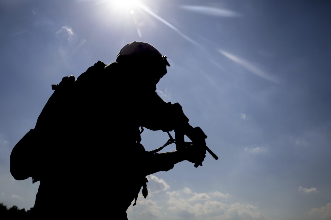 A Marine aims an M4 during a close-quarters battle range event as part of exercise Burmese Chase at Marine Corps Base Camp Lejeune, N.C., May 15, 2017. U.S. and NATO forces conduct the annual exercise to increase proficiency in fires, methods of insertion and small-unit tactics. Marine Corps photo by Marine Corps Lance Cpl. Holly Pernell