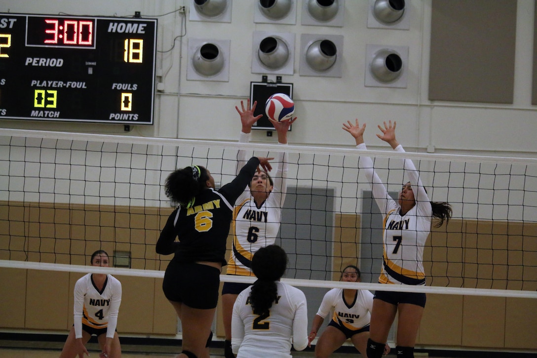 Army Sgt. Latoya Marshall goes for the kill in Match 3 against Navy of the 2017 Armed Forces Women's Volleyball Championship at Naval Station Mayport, Florida on 18 May.