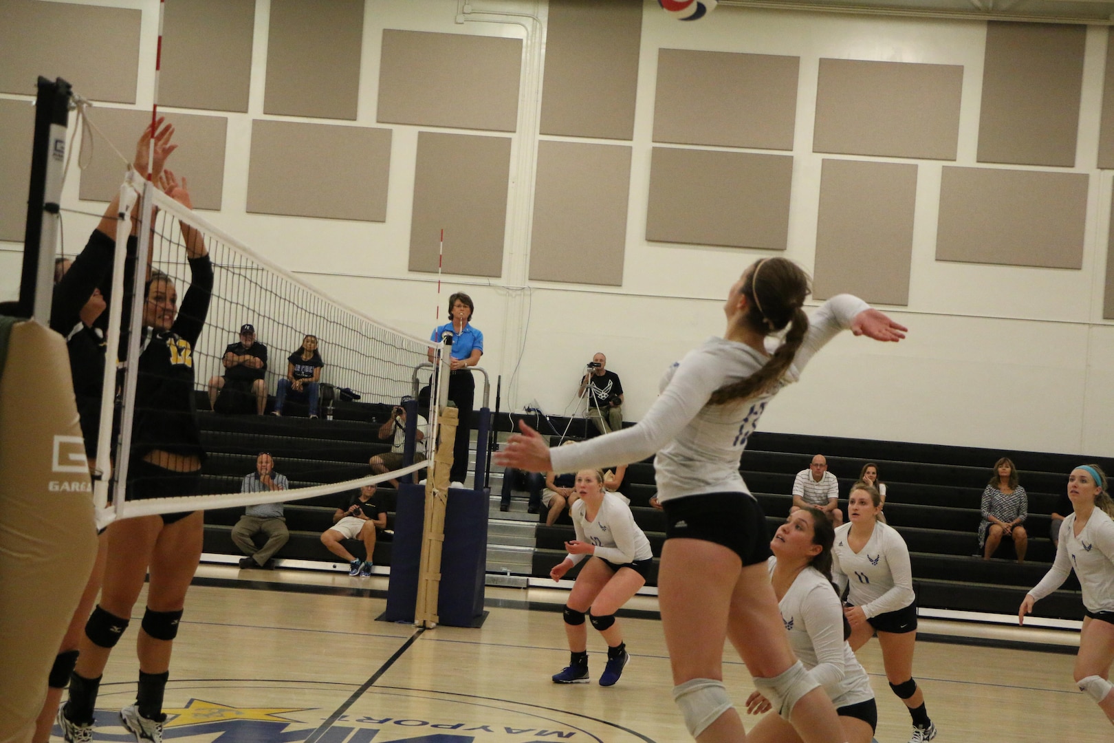 Air Force Capt. Caroline Kurtz of the U.S. Air Force Academy goes for the kill in Match 2 of the 2017 Armed Forces Women's Volleyball Championship at Naval Station Mayport, Florida on 18 May.