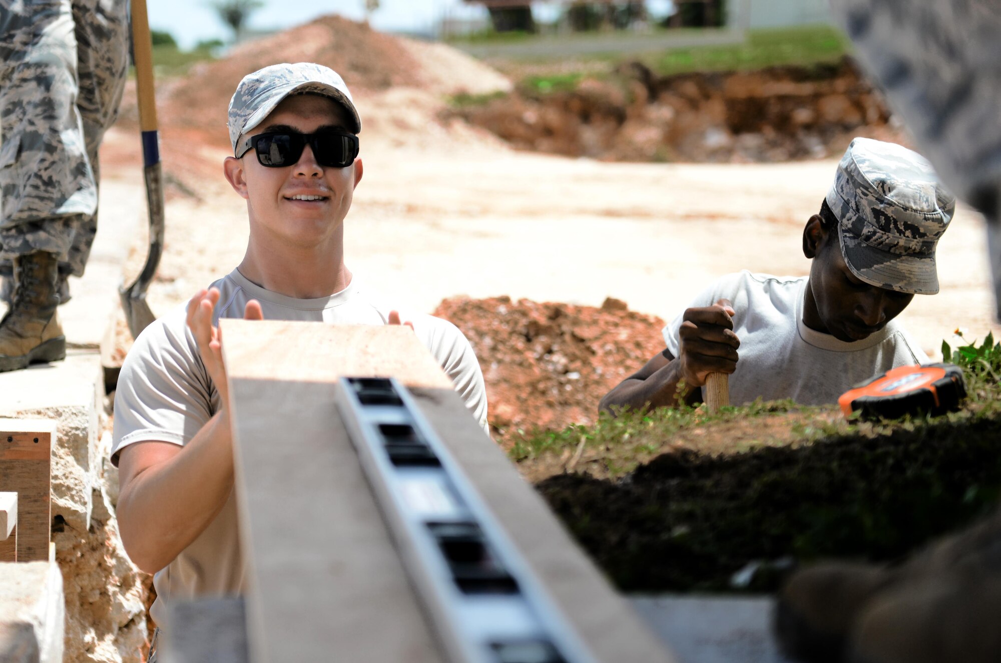 U.S. Air Force Airman 1st Class Austin Prendez, 36th Civil Engineering Squadron pavements and construction equipment journeyman, takes measurements for a project May 2, 2017, at Andersen Air Force Base, Guam. Prendez puts his skills to work to keep Andersen AFB operating and able to complete any mission as soon as possible. (U.S. Air Force photo by Airman 1st Class Gerald R. Willis)