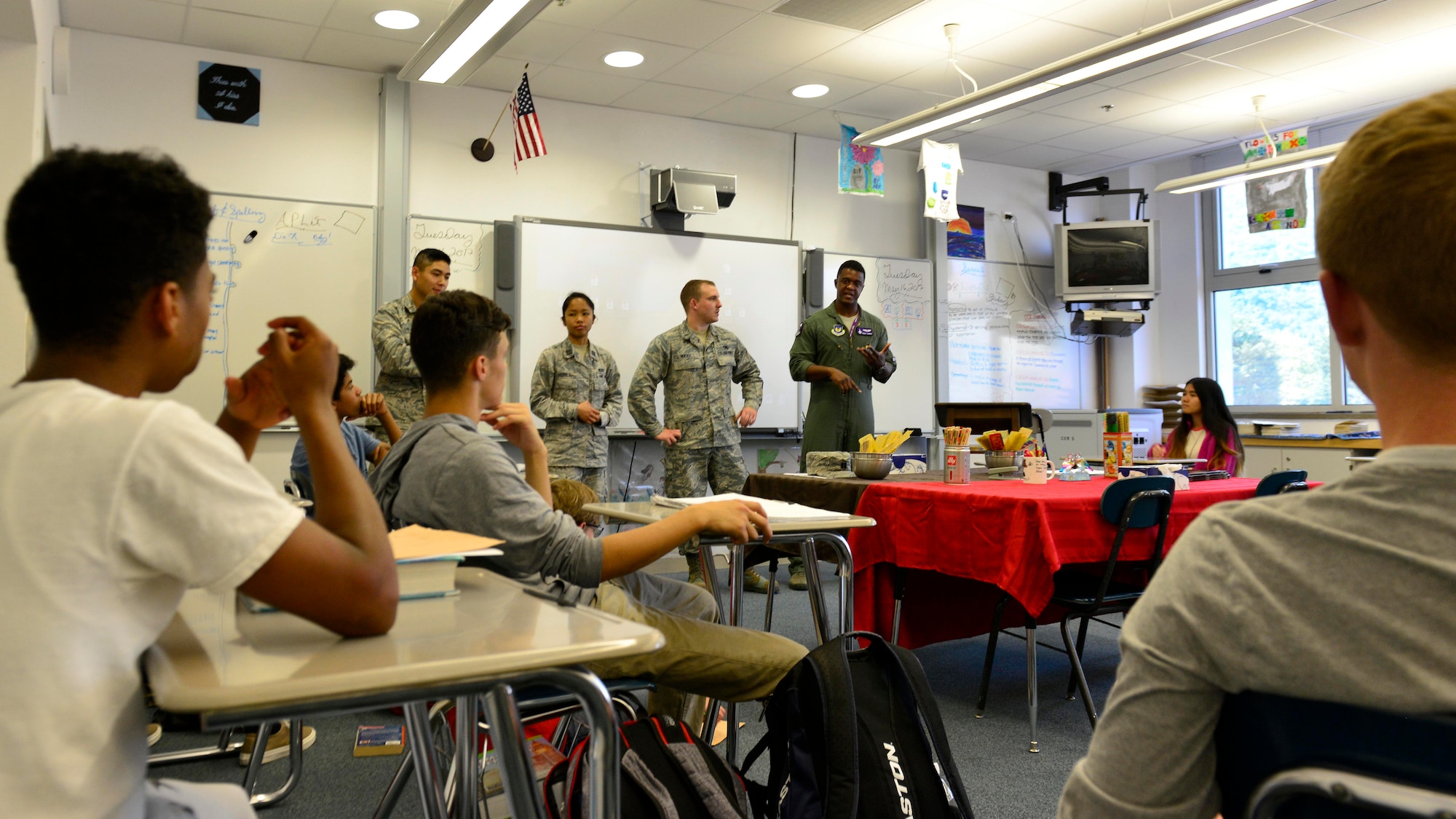 Air Force officers talk with high school students during career day, May 16, 2017, at Aviano Air Base, Italy. More than 40 students attended the hour-long seminar, asking questions about colleges and careers both in the military and civilian sector. (U.S. Air Force photo by Senior Airman Cary Smith)