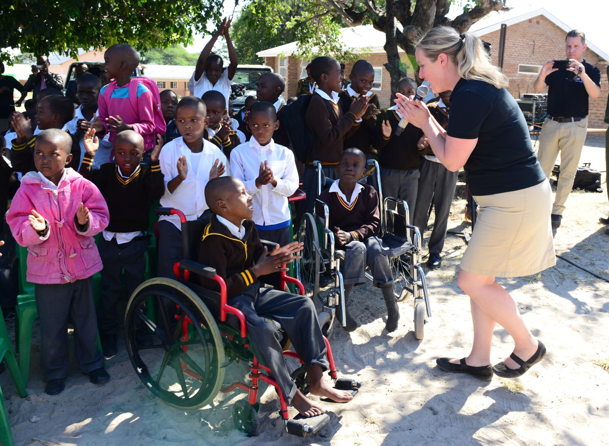Staff Sgt. Jill Diem, U.S. Air Forces in Europe Band vocalist, sings for students of the Kachikau Primary School in Kachikau, Botswana on May 17, 2017. The USAFE “Ambassadors Combo” performance Band and the Botswana Defence Force band performed together in several concerts at schools in northern Botswana to inspire the students through the universal language of music. Botswana and the U.S. are strong partners and engagements like these help to further strengthen the bonds between our two nations. (U.S. Air Force photo by Staff Sgt. Krystal Ardrey)