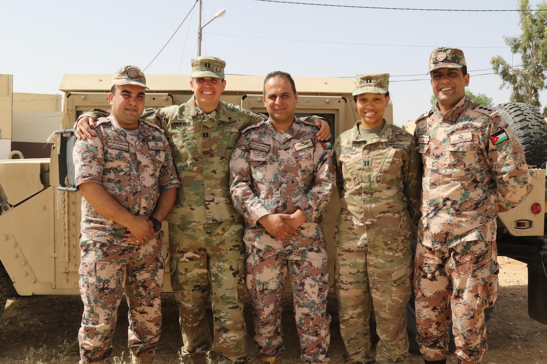 Jordanian and U.S. Army Central Soldiers stand in front of a Humvee, May 15, during exercise Eager Lion at the Joint Training Center in Jordan. Eager Lion 2017 is an annual U.S. Central Command exercise in Jordan designed to strengthen military-to-military relationships between the U.S., Jordan and other international partners. This year’s iteration is comprised of about 7,200 military personnel from more than 20 nations that will respond to scenarios involving border security, command and control, cyber defense and battlespace management.