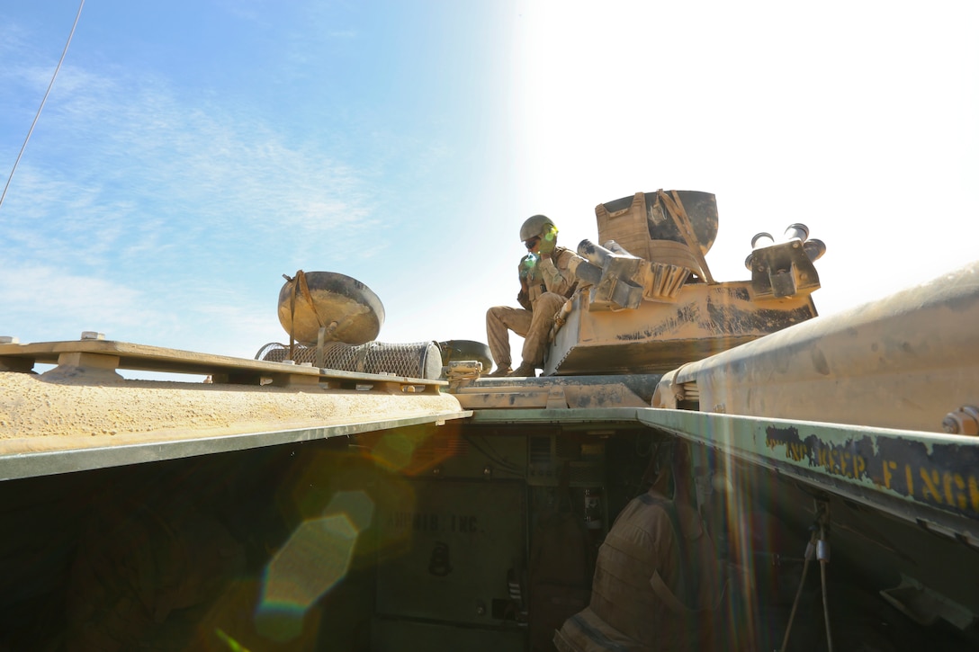 U.S. Marine Corporal Angel Curiel attached to 24th Marine Expeditionary Unit, prepares for takeoff in preparation for combined arms live fire exercise during Eager Lion 17, May 17 at Jordan. Eager Lion is an annual multinational exercise designed to strengthen military to military relationships, increase interoperability between partner nations, and enhance regional security and stability. (U.S. Marine Corps photo by Cpl. Jessica Y. Lucio)