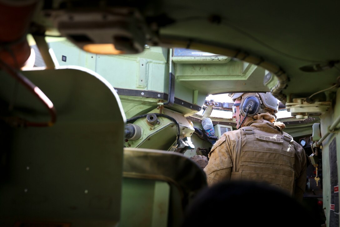 U.S. Marine Lance Cpl. Tony Riforgiate attached to 24th Marine Expeditionary Unit, makes final adjustments in preparation for combined arms live fire exercise during Eager Lion 17, May 17 at Jordan. Eager Lion is an annual multinational exercise designed to strengthen military to military relationships, increase interoperability between partner nations, and enhance regional security and stability. (U.S. Marine Corps photo by Cpl. Jessica Y. Lucio)