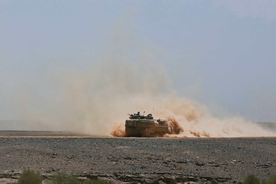 United States Marine Corps Amphibious Assault Vehicle P7/A1 engages towards a simulated target for combined arms live fire exercise during Eager Lion 17, May 17 at Jordan. Eager Lion is an annual multinational exercise designed to strengthen military to military relationships, increase interoperability between partner nations, and enhance regional security and stability. (U.S. Marine Corps photo by Cpl. Jessica Y. Lucio)