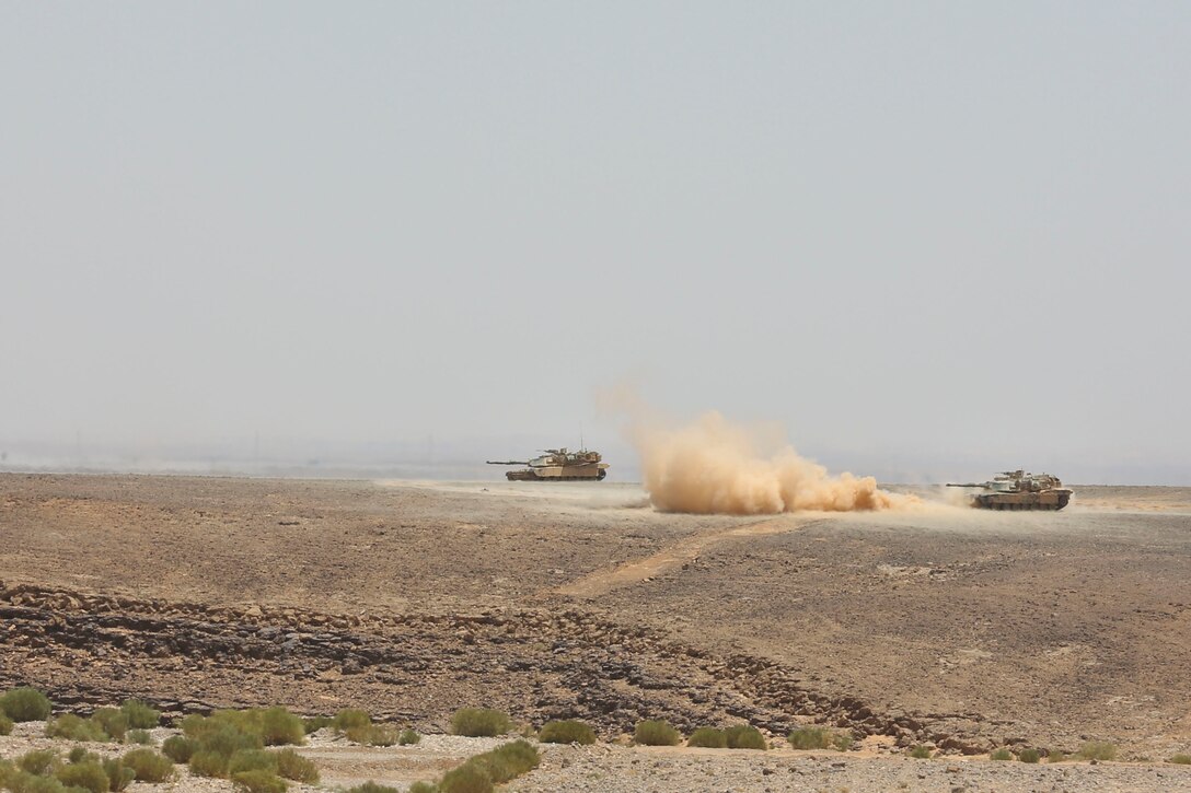 United States Marine Corps Amphibious Assault Vehicle P7/A1 fires towards a simulated target for combined arms live fire exercise during Eager Lion 17, May 17 at Jordan. Eager Lion is an annual multinational exercise designed to strengthen military to military relationships, increase interoperability between partner nations, and enhance regional security and stability. (U.S. Marine Corps photo by Cpl. Jessica Y. Lucio)