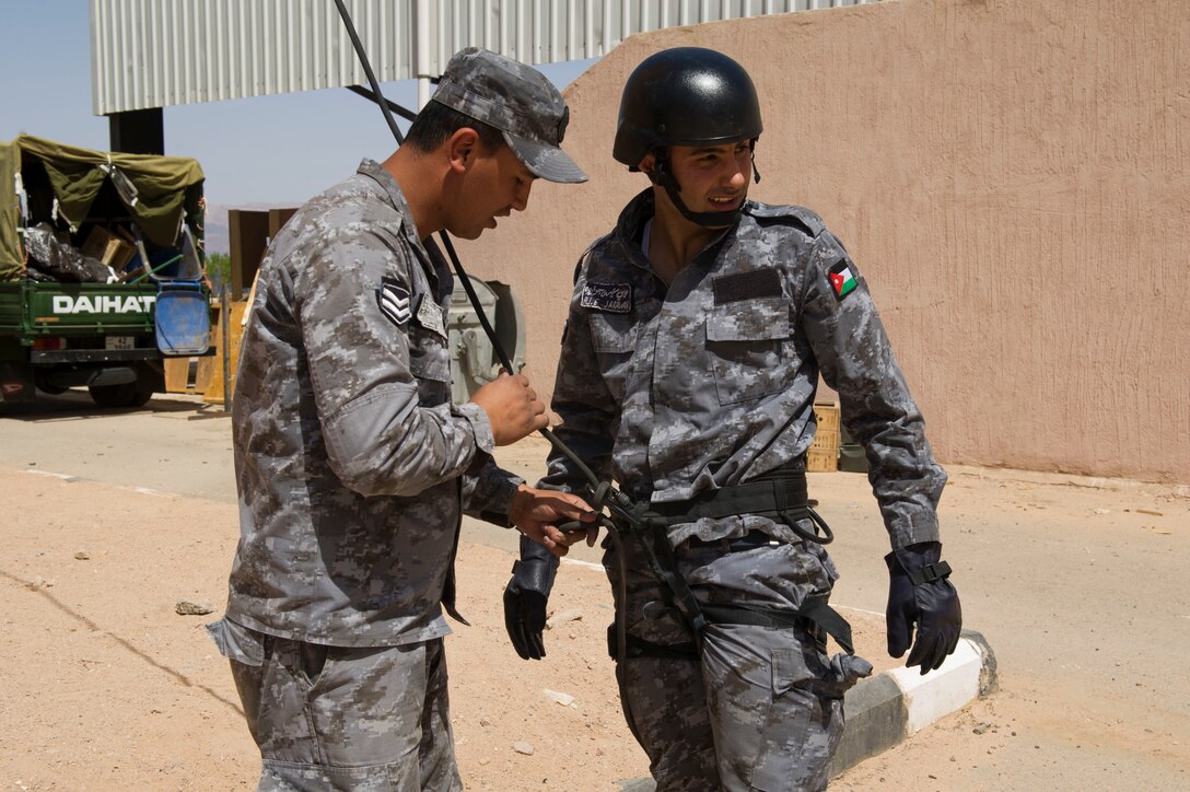 Members of the Royal Jordanian Navy conduct repelling training in support of Exercise Eager Lion 2017. Eager Lion is an annual U.S. Central Command exercise in Jordan designed to strengthen military-to- military relationships between the U.S., Jordan and other international partners. This year's iteration is comprised of about 7,200 military personnel from more than 20 nations that will respond to scenarios involving border security, command and control, cyber defense and battlespace management. (U.S. Navy Combat Camera photo by Mass Communication Specialist 2nd Class Austin L. Simmons)