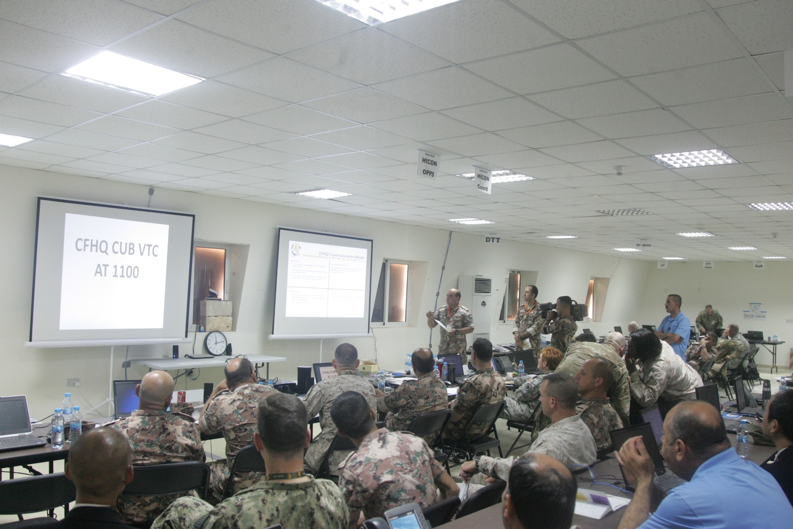 Jordanian Army officer Lt. Mohammad Alkhawaldeh, center, gives a communications brief at the higher command center during exercise Eager Lion, May 15, at the Joint Training Center in Jordan. Eager Lion 2017 is an annual U.S. Central Command exercise in Jordan designed to strengthen military-to-military relationships between the U.S., Jordan and other international partners. This year’s iteration is comprised of about 7,200 military personnel from more than 20 nations that will respond to scenarios involving border security, command and control, cyber defense and battlespace management.  (Photo by Moath Aleen, Jordanian Army).