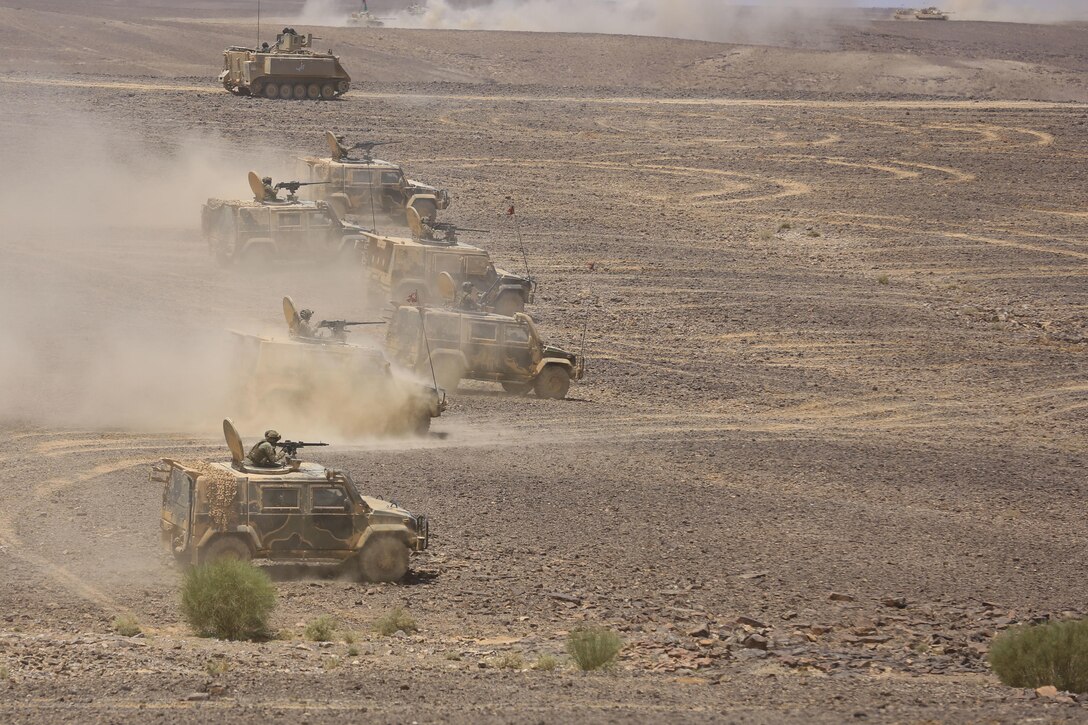 US, Jordanian and Italian forces, engage on a simulated target for combined arms live fire exercise during Eager Lion 17, May 17 at Jordan. Eager Lion is an annual multinational exercise designed to strengthen military to military relationships, increase interoperability between partner nations, and enhance regional security and stability. (U.S. Marine Corps photo by Cpl. Jessica Y. Lucio)