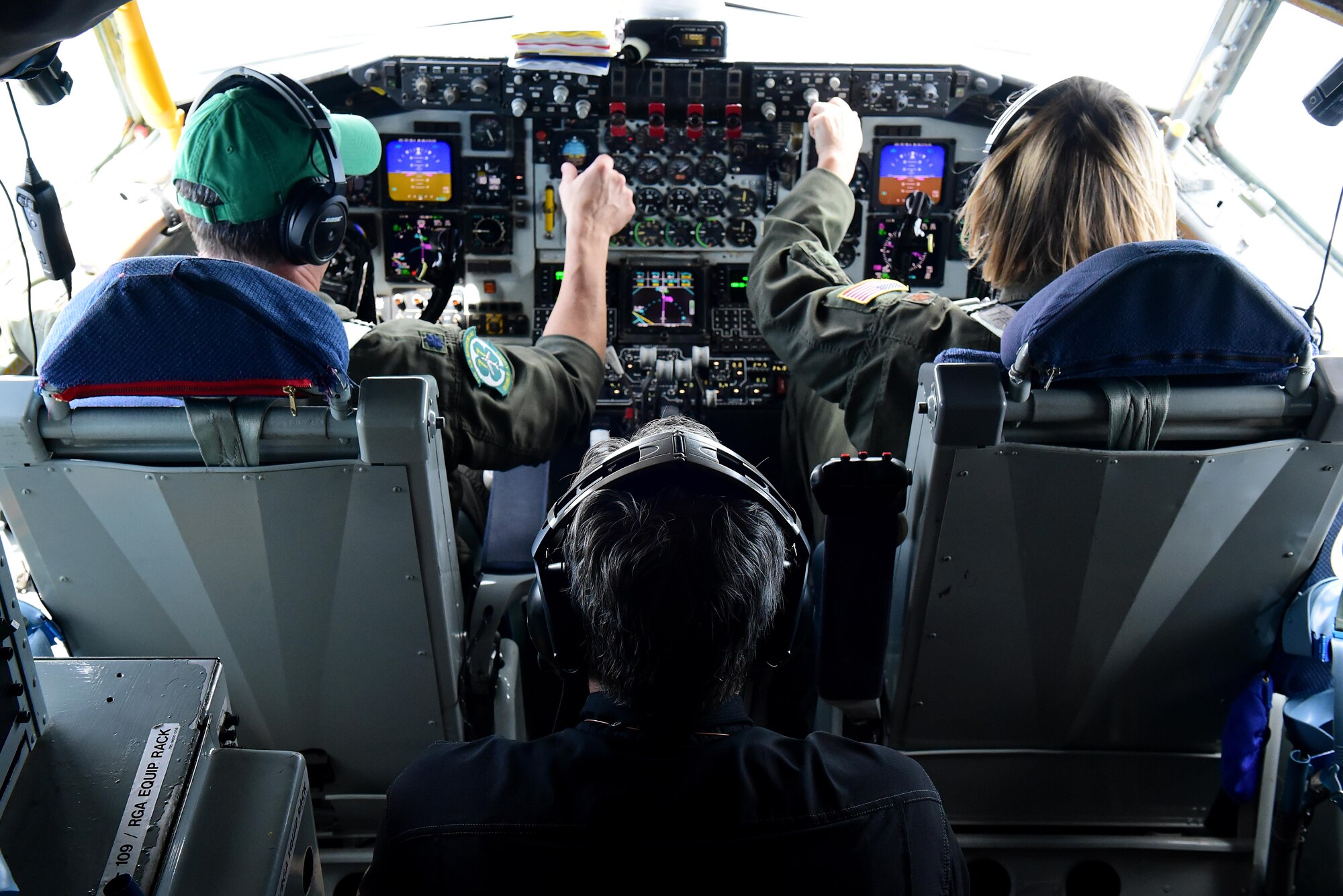 Lt. Col. Wayne Turner and Maj. Amanda Person, 77th Air Refueling Squadron, KC-135R Stratotanker pilots, fly civic leaders including Lt. Governor of North Carolina, Dan Forest, May 18, 2017, in the skies over Seymour Johnson Air Force Base, North Carolina. The flight occurred two days prior to the opening ceremony of Wings Over Wayne Air Show, which will headline the U.S. Navy Blue Angels premiere aerial demonstration team. (U.S. Air Force photo by Airman 1st Class Kenneth Boyton)