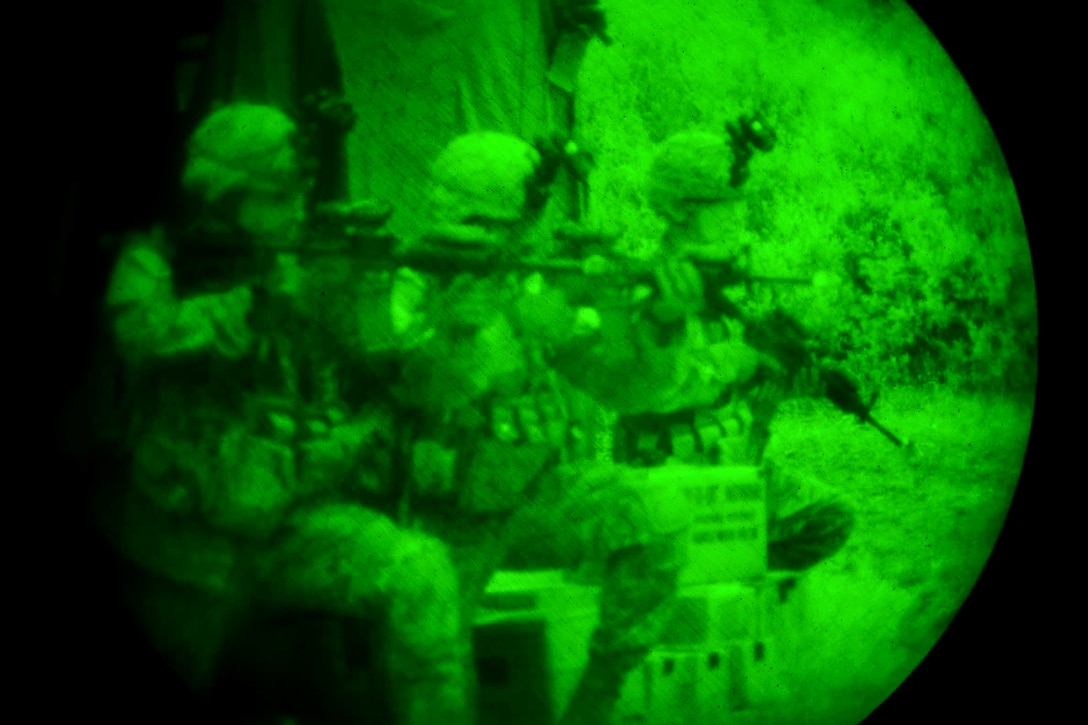 As seen through a night-vision lens, U.S. soldiers provide security during a night raid on an enemy camp during Bayonet-Minotaur Exercise 2017 in Thessaloniki, Greece, May 17, 2017. Army photo by Graigg Faggionato