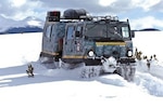 An M973A1 Small Unit Support Vehicle, or SUSV, clad in emergency lights and digital camouflage, claws its way through the snow at Taylor Park Reservoir near Gunnison, Colo., March 15, 2010. The SUSV, which is capable of traversing almost any terrain, is the primary vehicle used by the Colorado Army National Guard’s Snow Response Teams. 