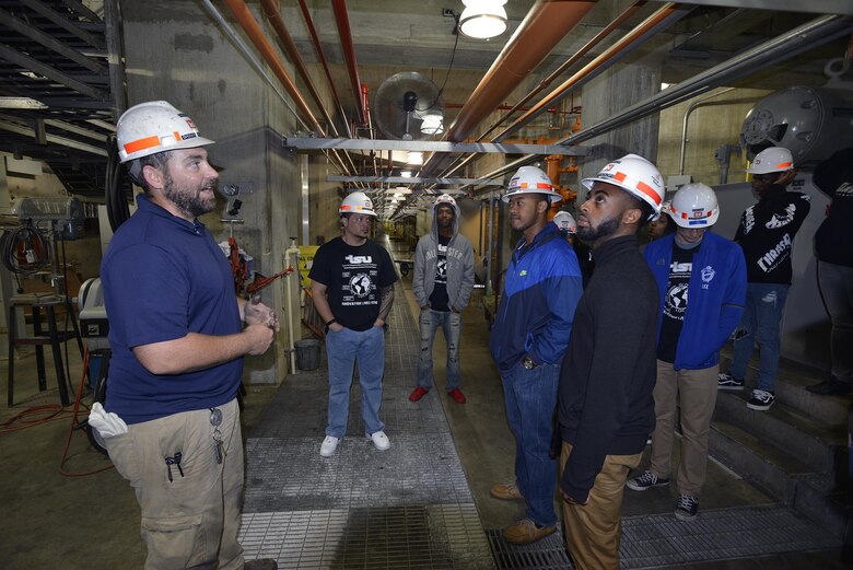 John Bell, hydropower operator trainee, explains to a group of high school and college students in the control room about procedures and how water passes through generating units using a gravity-fed system at the Old Hickory Dam Hydropower Plan in Hendersonville, Tenn., Thursday, May 4, 2017. 