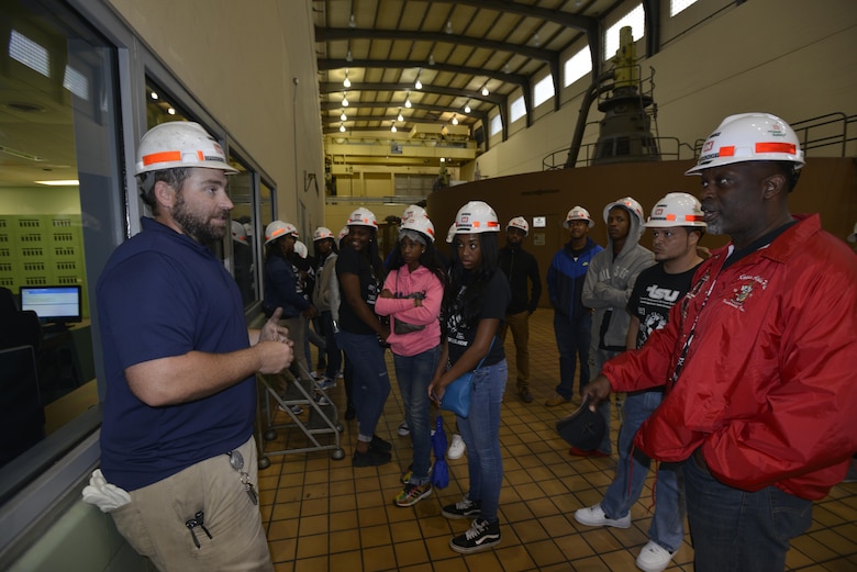 John Bell, Old Hickory power plant operator trainee, talks with Reginald Young, a business specialist at Tennessee State University in Nashville, about control room functions during a tour of the Old Hickory Hydropower Plant in Hendersonville, Tenn., May 4, 2017.   