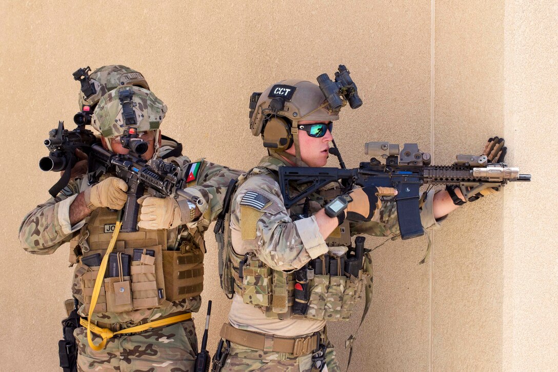 A U.S. airman, right, and a member of the Jordanian Special Forces provide perimeter security during an exercise at the King Abdullah II Special Operations Training Center during Eager Lion 2017 in Amman, Jordan, May 11, 2017. Navy photo by Petty Officer 2nd Class Christopher Lange