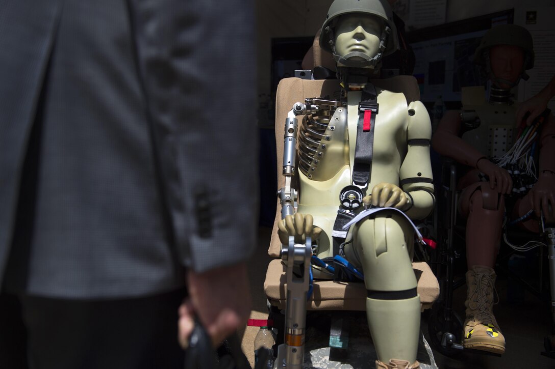 A guest views a U.S. Army Research Development and Engineering Command dummy designed to test the effects of improvised explosive devices during DoD Lab Day at the Pentagon, May 18, 2017. DoD photo by EJ Hersom