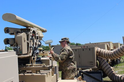 Sgt. Sasha Durnal, a watercraft operator assigned to the 338th Transportation Detachment (Harbormaster), installs a sensor on the Harbormaster Command and Control Center  (HCCC) at Joint Expeditionary Base Little Creek-Fort Story, Virginia Beach, Va. May 14, 2017.  Durnal traveled to the area along with nearly 450 U.S. Army Reserve Soldiers for Big Logistics Over the Shore (Big LOTS) East 2017, a U.S. Army Reserve exercise that provides hands-on training for boat units, terminal battalions, and deployment support command units to sharpen critical tasks that support bare beach operations.  (U.S. Army Reserve Photo by 1st Sgt. Angele Ringo)