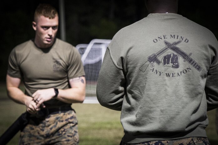 Cpl. Jamie Brooks instructs A Marine to prepare him for a Marine Corps Martial Arts belt test aboard Marine Corps Air Station Beaufort, May 15. Brooks is a MCMAP Instructor and sports coach. He spends two hours every morning teaching Marines MCMAP and volunteers for an hour after work three times a week to coach a youth sports team. He also spends one weekend a month volunteering at events in the local Beaufort community. Brooks is an administrative specialist with Headquarters and Headquarters Squadron.