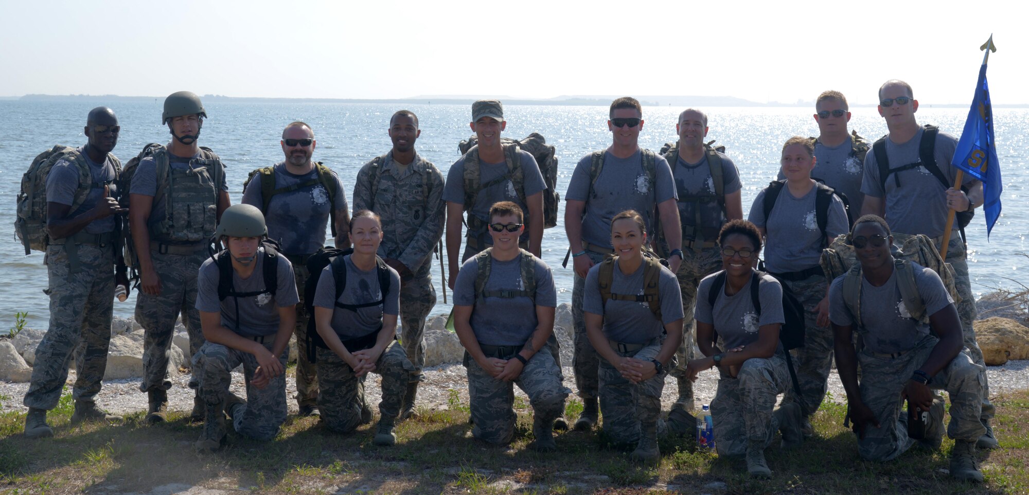Airmen from the 6th Security Forces Squadron (SFS) pause for a photo at MacDill Air Force Base, Fla., May 15, 2017. The 6th SFS held an opening ceremony and completed a 5K ruck march in honor of National Police Week, May 15-21, 2017. (U.S. Air Force photo by Senior Airman Tori Long)