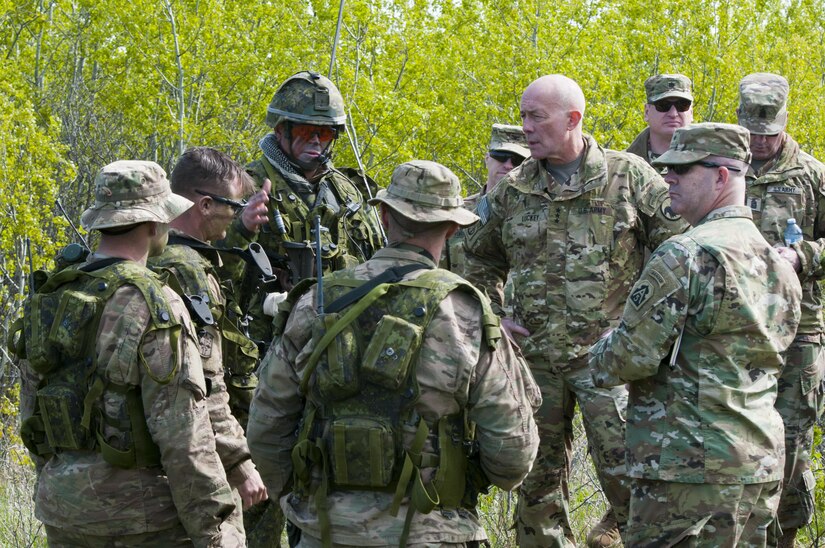 Lt. Gen. Charles Luckey, chief of Army Reserve and commanding general of United States Army Reserve Command, visits Soldiers with C Troop, 2nd Brigade, 10th Mountain Division, and Canadian Soldiers with the 3rd Royal Canadian Regiment on May 18, 2017, in Camp Wainwright, Alberta, Canada, during Maple Resolve 17. More than 650 U.S. Army Soldiers are supporting Maple Resolve 17, the Canadian Army’s premiere brigade-level validation exercise running May 14-29 at Camp Wainwright. As part of the exercise, the U.S. Army is providing a wide array of combat and support elements. These include sustainment, psychological operations, public affairs, aviation and medical units. (U.S. Army Reserve photo by Staff Sgt. Michael Crawford)