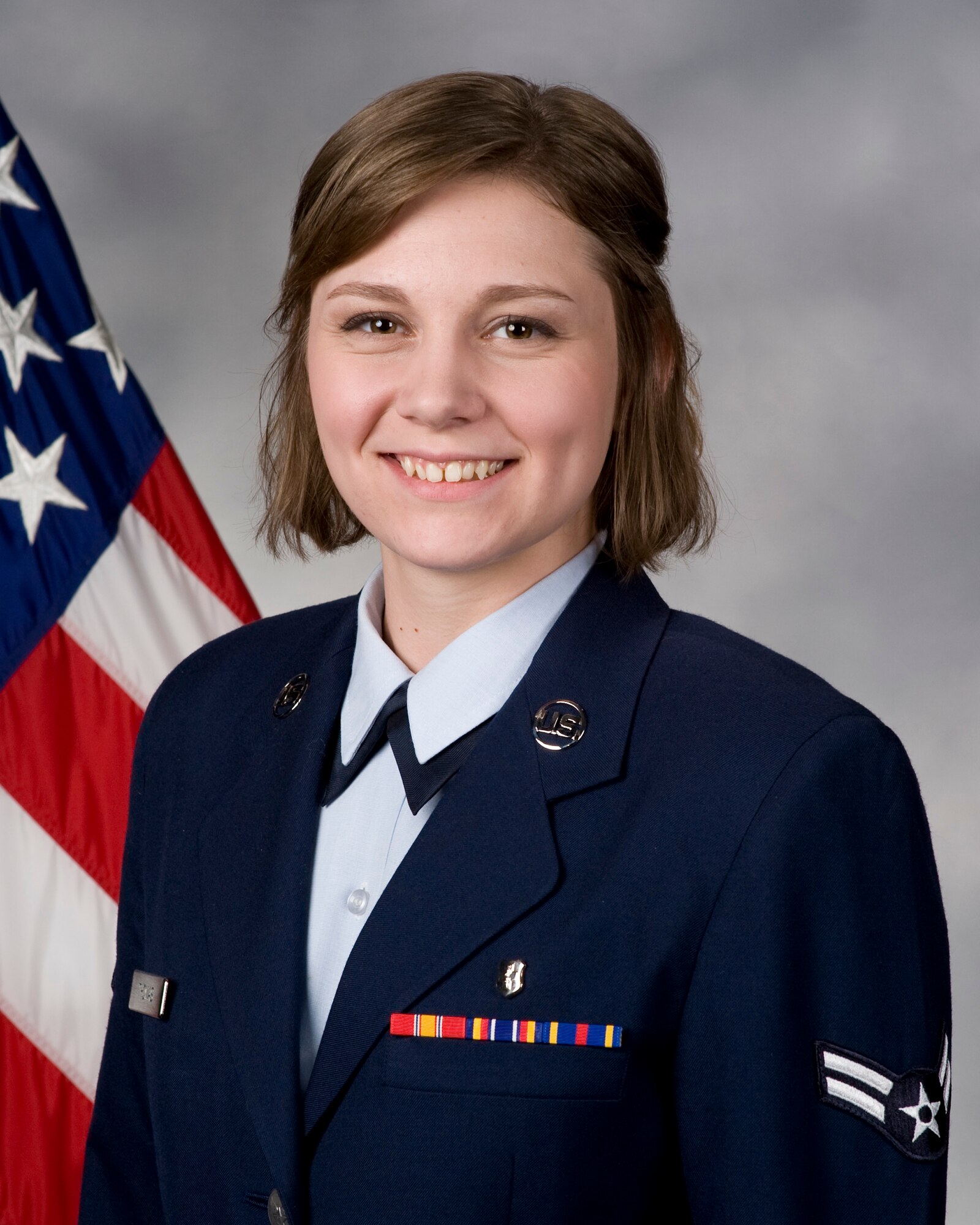 Airman 1st Class Karie Thomas, 436th Aerospace Medicine Squadron public health technician, poses for an official photo Feb. 23, 2017, at Dover Air Force Base, Del. Thomas was named the 2016 Air Force Sergeants Association Division 1 Airman of the Year and will compete at the international level in July. (U.S. Air Force photo by Mauricio Campino)