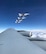 A view of four U.S. Air Force Thunderbirds flanked alongside an Okie KC-135 Stratotanker assigned to the 465th Air Refueling Squadron, 507th Air Refueling Wing, as they await refueling May 18, 2017, on their journey to Tinker Air Force Base for the 2017 Star Spangled Salute Air Show. The air show, scheduled for May 20-21, will commemorate the 75th Anniversary of Tinker AFB. (U.S. Air Force photo/Tech. Sgt. Lauren Gleason)