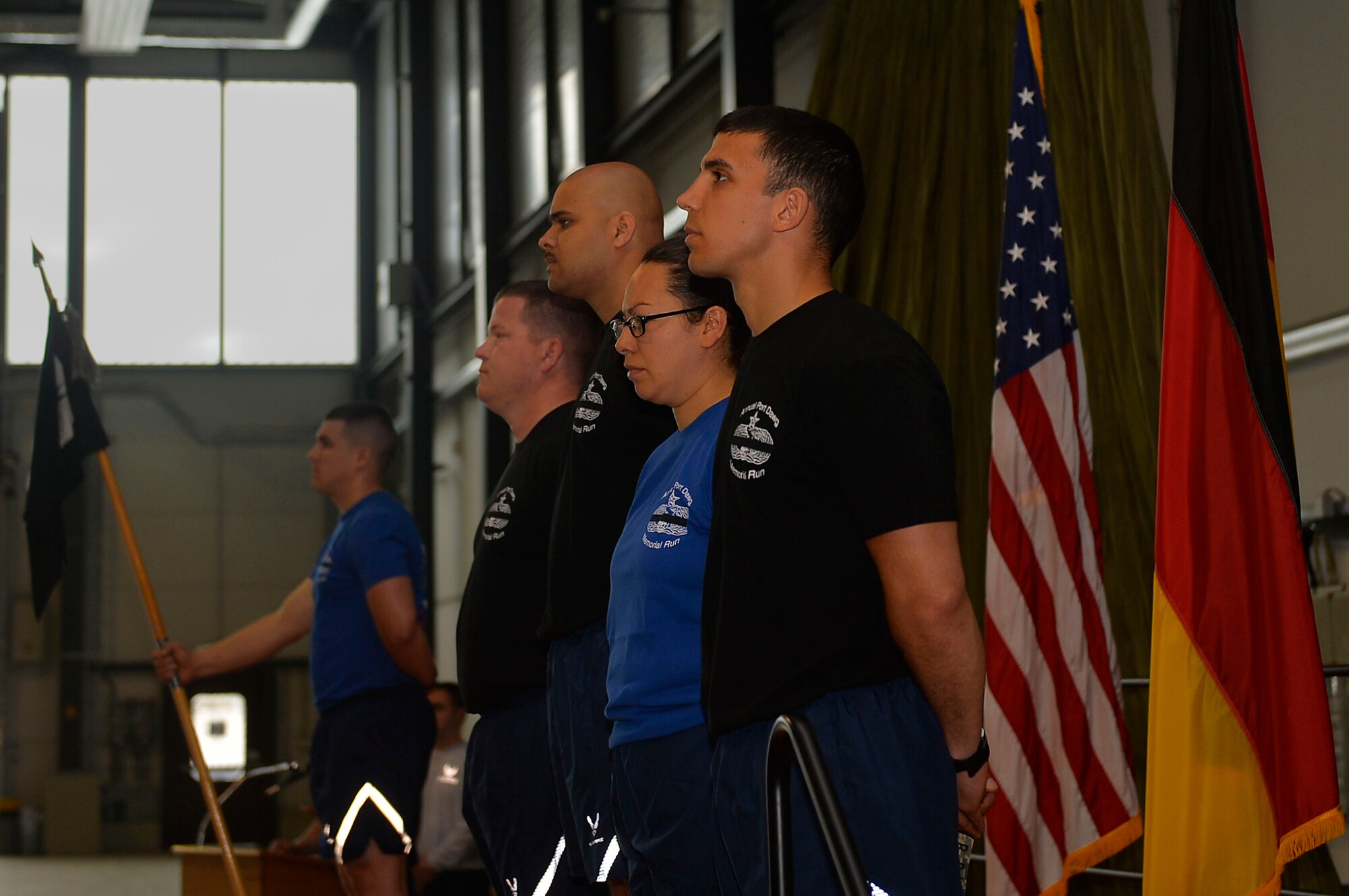 721st Aerial Port Squadron Airmen conduct a memorial ceremony on Ramstein Air Base, Germany, May 19, 2017, for four aerial port Airmen who died over the past year. Airmen of the 721st APS hold an annual memorial run to commemorate their fallen colleagues from different bases. (U.S. Air Force photo by Airman 1st Class Joshua Magbanua)