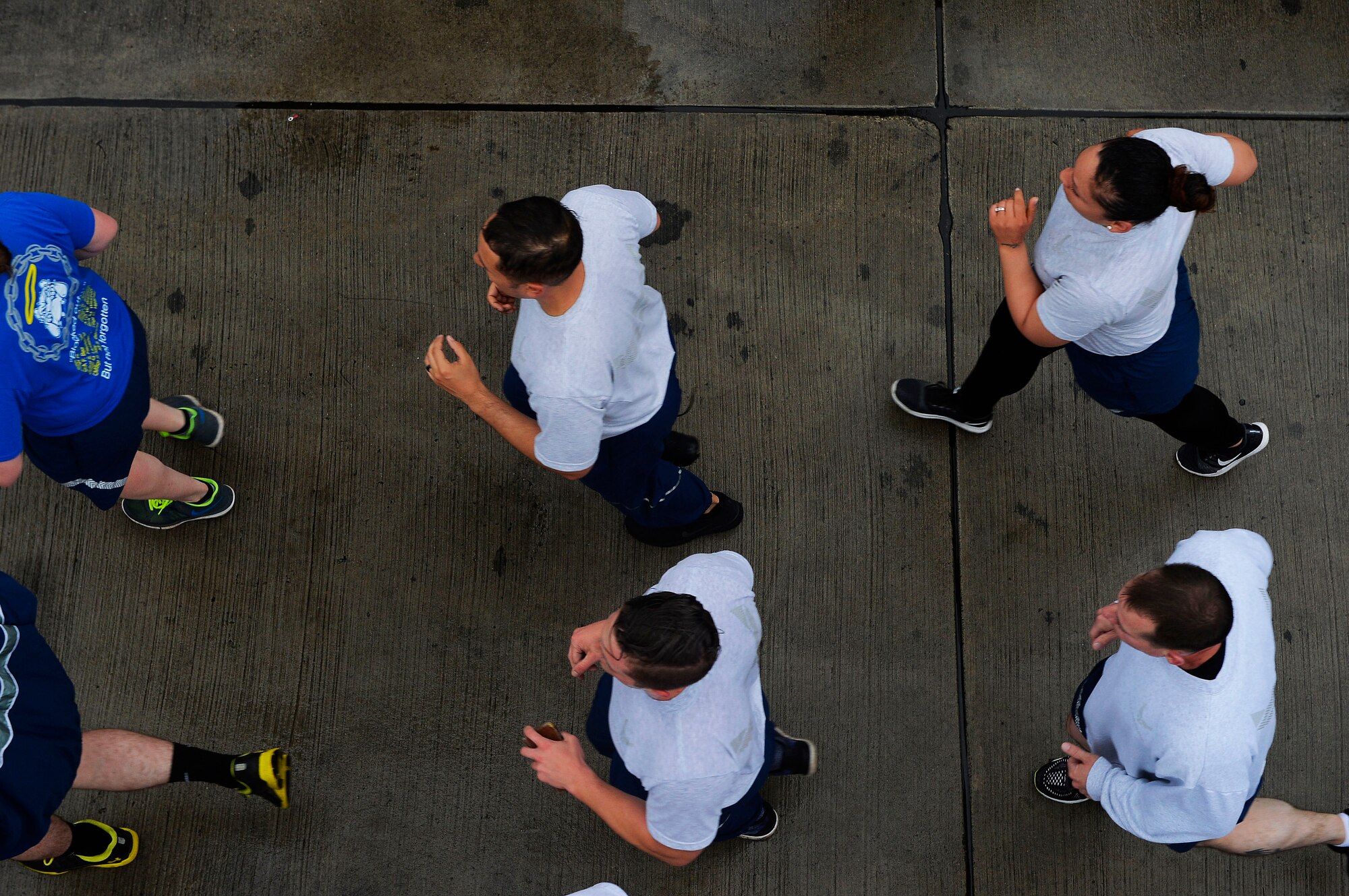 721st Aerial Port Squadron Airmen conduct a memorial run on Ramstein Air Base, Germany, May 19, 2017. The event was held in honor of four aerial port Airmen who lost their lives over the past year in bases. (U.S. Air Force photo by Airman 1st Class Joshua Magbanua) 