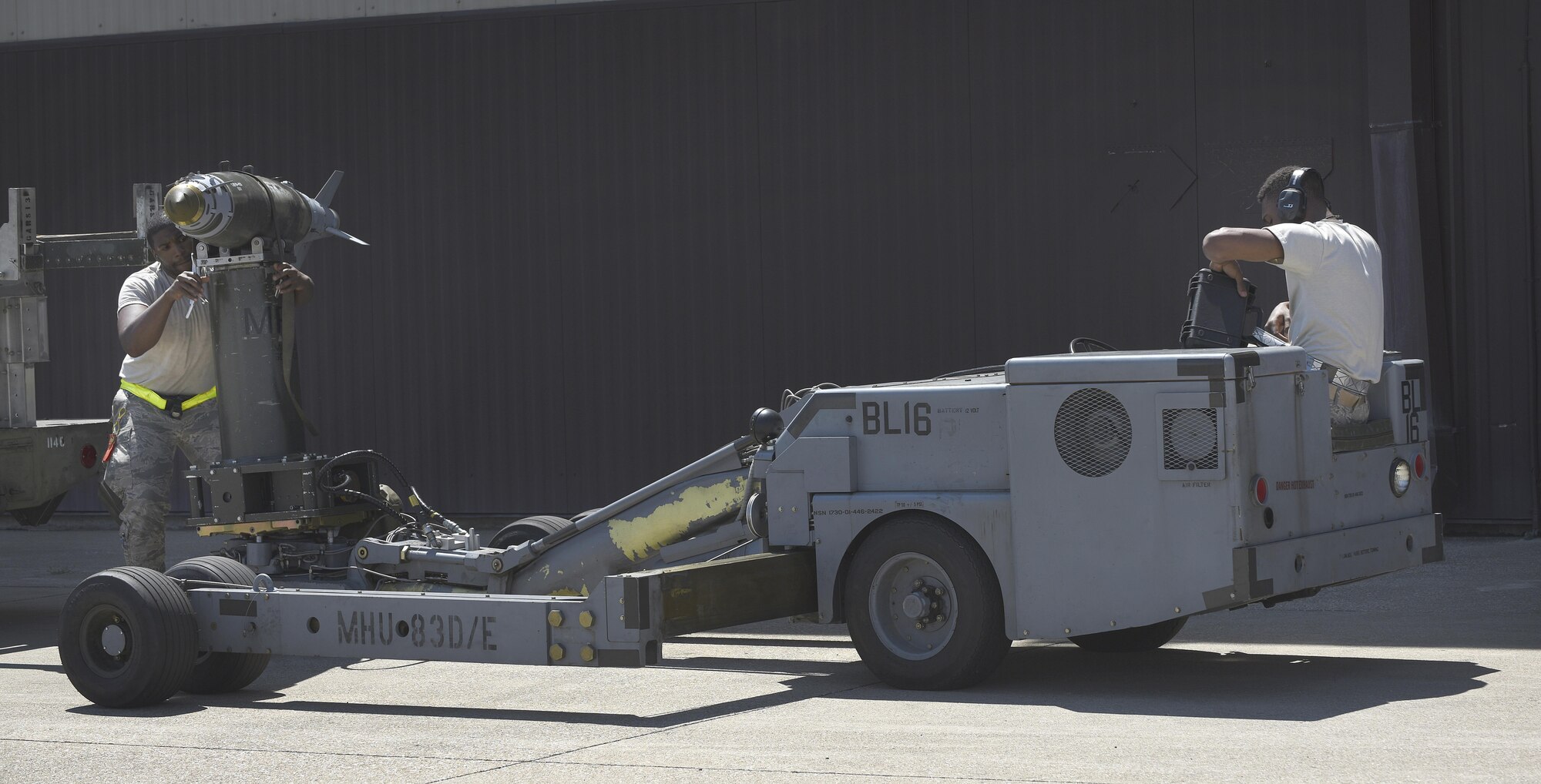 Total Force Airmen assigned to the 509th Maintenance Group (MXG) and the 131st MXG participate in an annual exercise known as Combat Hammer on the flightline at Whiteman Air Force Base, Mo., May 8-12, 2017. Combat Hammer is an in-depth analysis of Team Whiteman’s conventional weapon employment capability. It involves the MXG Airmen building and loading weapons on the aircraft, then analyzing the impact of dropping those weapons in different orders, from different altitudes, and different angles of attack on the training range. By demonstrating this entire process, the Total Force team is able to assess the reliability and lethality of the B-2 Spirit’s weapons system. (U.S. Air Force photo by Senior Airman Danielle Quilla)