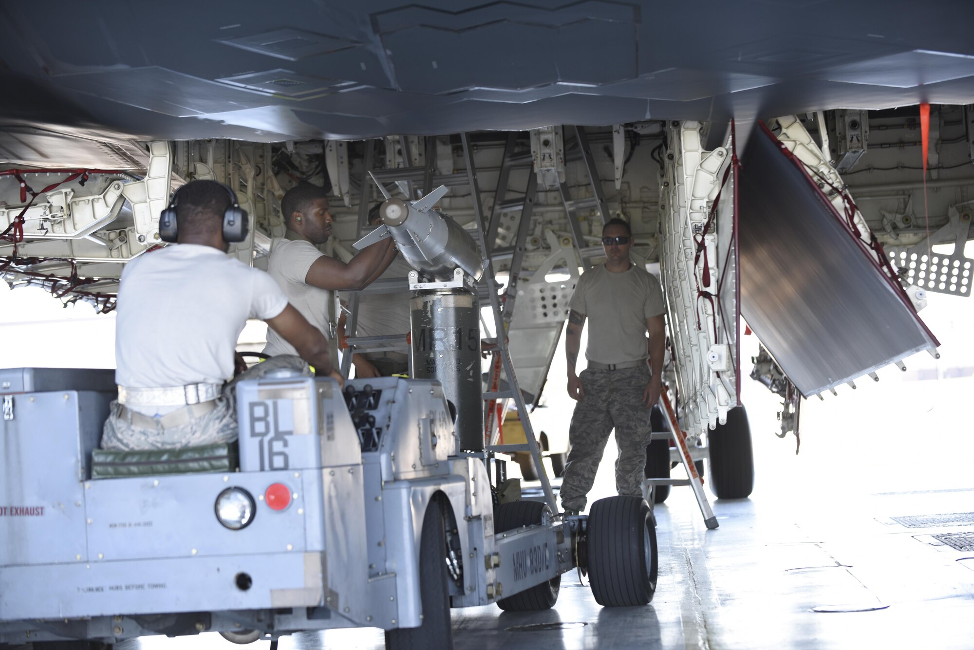 Total Force Airmen assigned to the 509th Maintenance Group (MXG) and the 131st MXG participate in an annual exercise known as Combat Hammer on the flightline at Whiteman Air Force Base, Mo., May 8-12, 2017. Combat Hammer is an in-depth analysis of Team Whiteman’s conventional weapon employment capability. It involves the MXG Airmen building and loading weapons on the aircraft, then analyzing the impact of dropping those weapons in different orders, from different altitudes, and different angles of attack on the training range. By demonstrating this entire process, the Total Force team is able to assess the reliability and lethality of the B-2 Spirit’s weapons system. (U.S. Air Force photo by Senior Airman Danielle Quilla)