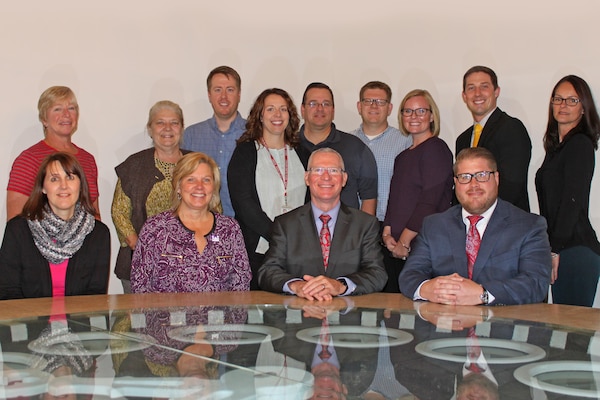 Stuart A. Hazlett (front row, center), director of contracting for USACE, visited the District’s contracting office in October 2016 to review their contracting efforts.