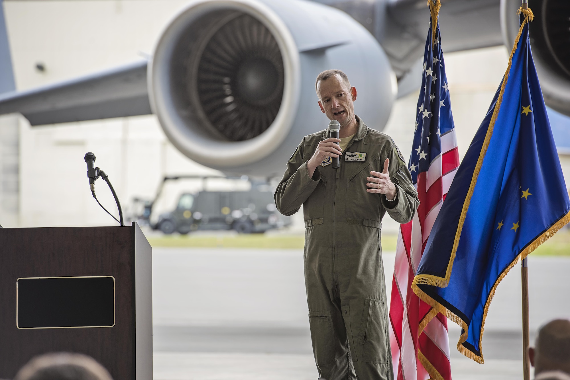 Col. Steven deMilliano, commander of the 176th Wing, Alaska Air National Guard, and Col. Christopher Niemi, commander of the 3rd Wing, U.S. Air Force, commemorated the change of assignment of eight C-17 Globe Master III aircraft based here during a ceremony on Joint Base Elmendorf-Richardson, Alaska, May 17. The two commanders took turns speaking to Airmen from both Wings about the transfer of the aircraft from active duty to the Guard and how the units will continue to support the C-17 mission together in the arctic and Pacific regions. (U.S. Air National Guard photo by Staff Sgt. Edward Eagerton/released)