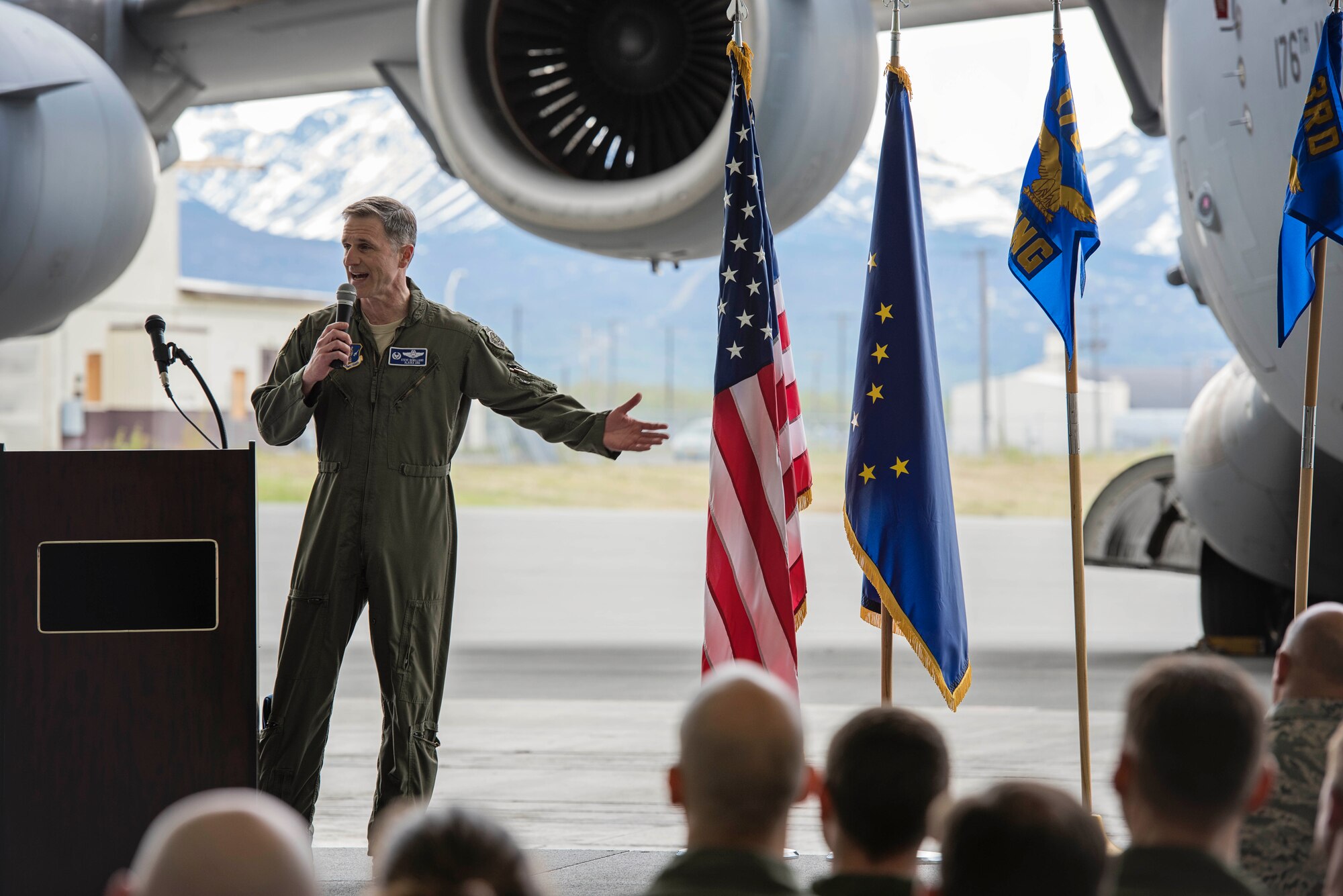 Col. Steven deMilliano, commander of the 176th Wing, Alaska Air National Guard, and Col. Christopher Niemi, commander of the 3rd Wing, U.S. Air Force, commemorated the change of assignment of eight C-17 Globe Master III aircraft based here during a ceremony on Joint Base Elmendorf-Richardson, Alaska, May 17. The two commanders took turns speaking to Airmen from both Wings about the transfer of the aircraft from active duty to the Guard and how the units will continue to support the C-17 mission together in the arctic and Pacific regions. (U.S. Air National Guard photo by Staff Sgt. Edward Eagerton/released)