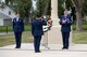 Airman Colin Coffman, 75th Security Forces Squadron, salutes a wreath honoring fallen peace officers during a retreat ceremony May 18 at Hill Air Force Base. The 75th Security Forces Squadron Defenders Association hosted the ceremony as part of National Police Week activities. Also pictured are Airman 1st Class Latina Garcia and Airman 1st Class Hunter Nelson, both 75th SFS. (U.S. Air Force/Todd Cromar)