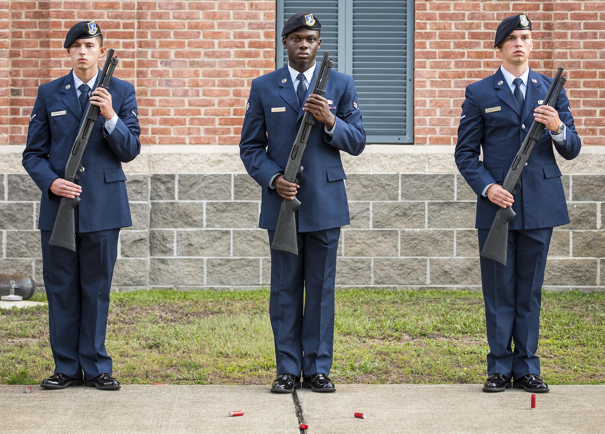 Shells lay at the feet of 1st Special Operations Security Forces Squadron Airmen after providing a shotgun volley with Fort Walton Beach Police officers at the Peace Officers’ Memorial Ceremony May 18 in Fort Walton Beach, Fla. The ceremony was to honor fallen police officers from the previous year by reading their names aloud. Security forces Airmen from Eglin and Hurlburt Field attended and participated in the event. The ceremony is one of many events taking place during National Police Week. (U.S. Air Force photo/Samuel King Jr.)