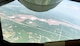 Seven U.S. Air Force Thunderbirds fly in formation over Lake Arcadia behind a Reserve KC-135 Stratotanker assigned to the 465th Air Refueling Squadron, 507th Air Refueling Wing, May 18, 2017, prior to landing at Tinker Air Force Base for the 2017 Star Spangled Salute Air Show. (U.S. Air Force photo/Tech. Sgt. Lauren Gleason/Released) 