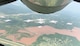 Seven U.S. Air Force Thunderbirds fly in formation over Lake Arcadia behind a Reserve KC-135 Stratotanker assigned to the 465th Air Refueling Squadron, 507th Air Refueling Wing, May 18, 2017, prior to landing at Tinker Air Force Base for the 2017 Star Spangled Salute Air Show. (U.S. Air Force photo/Tech. Sgt. Lauren Gleason/Released) 