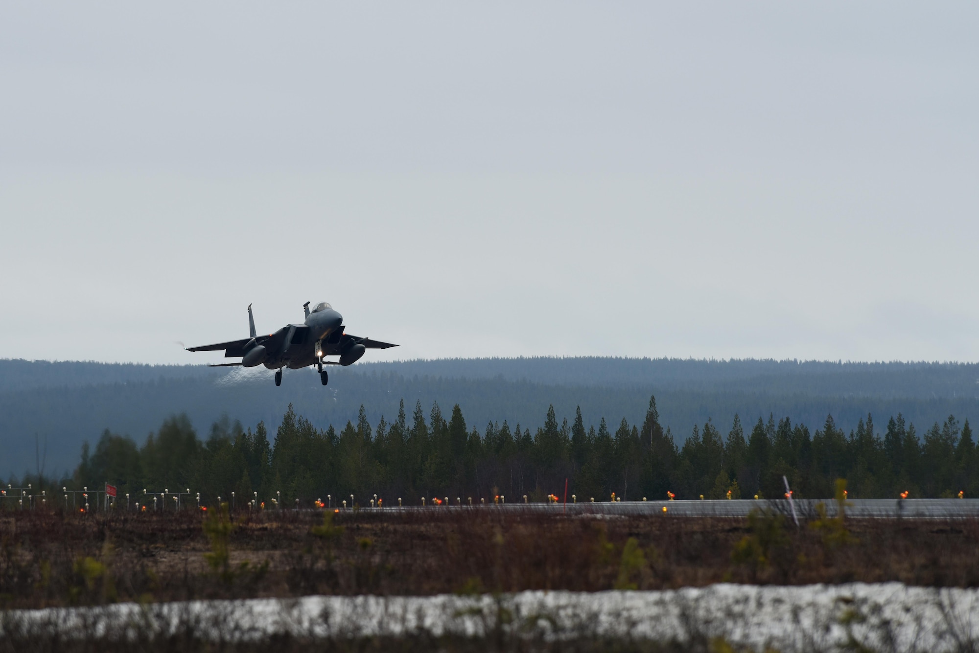 A F-15C Eagle from Royal Air Force Lakenheath, England, lands at Rovaniemi Air Base, Finland, May 19, in support of Arctic Challenge 2017. The two-week long exercise, aimed at improving our overall coordination with our allies and partner militaries, starts May 22. (U.S. Air Force photo/Airman 1st Class Abby L. Finkel)