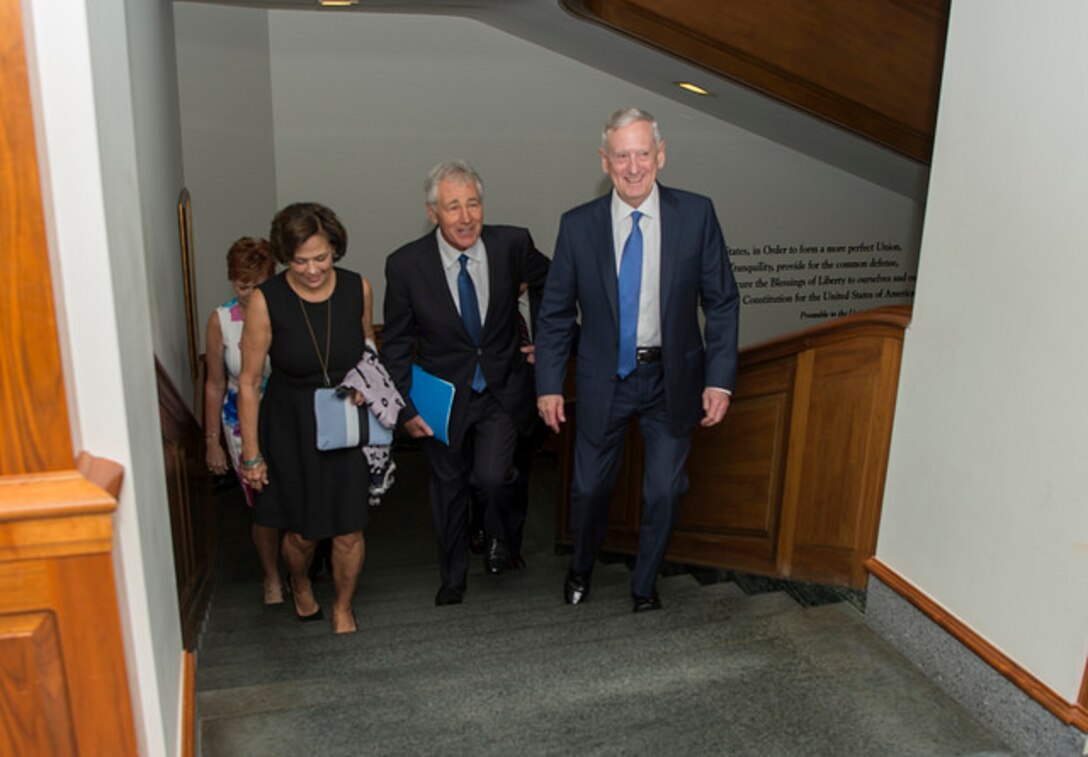 Defense Secretary Jim Mattis walks with former Defense Secretary Chuck Hagel and his family before an office call at the Pentagon, May 19, 2017. Hagel served as the 24th Secretary of Defense from February 2013 to February 2015. DoD photo by Army Sgt. Amber I. Smith