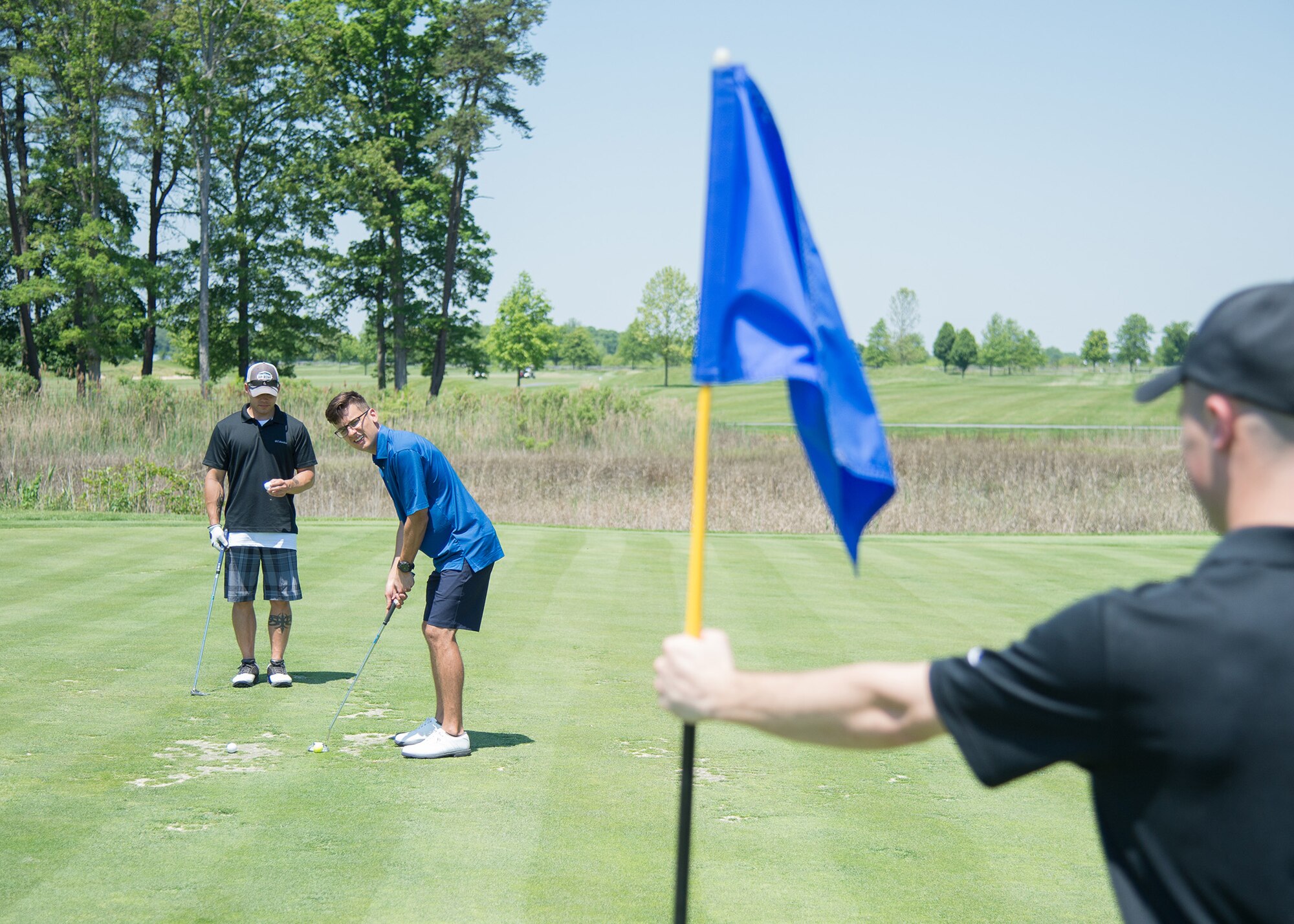 Senior Airman Bryon Grimco Jr., 736th Aircraft Maintenance Squadron C-17 crewchief, prepares to putt at the 2017 spring Bluesuiters Golf Tournament May 17, 2017, 2016, at the Jonathan’s Landing Golf Course in Magnolia, Delaware. The biannual tournament also features raffles, door prizes and dinner at the clubhouse. (U.S. Air Force photo by Mauricio Campino)
