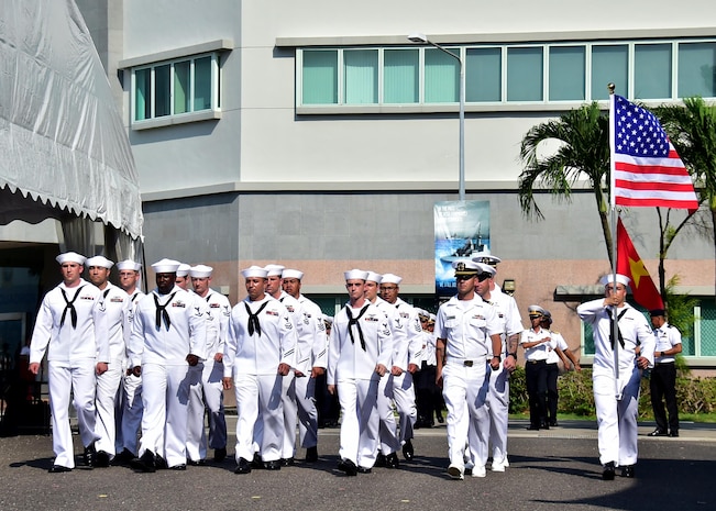 Sailors assigned to the Arleigh Burke-class guided missile destroyer USS Sterett (DDG 104) march in formation at the international honor guard delegation during the International Maritime Review and 50th anniversary of the Republic of Singapore Navy at RSS Singapura-Changi Naval Base, May 15, 2017. The International Maritime Defense Exhibition 2017 is hosted by the Republic of Singapore and is one of the largest maritime exhibitions in the Asia Pacific and features a trade show and a series of multilateral exercises and exchanges. 