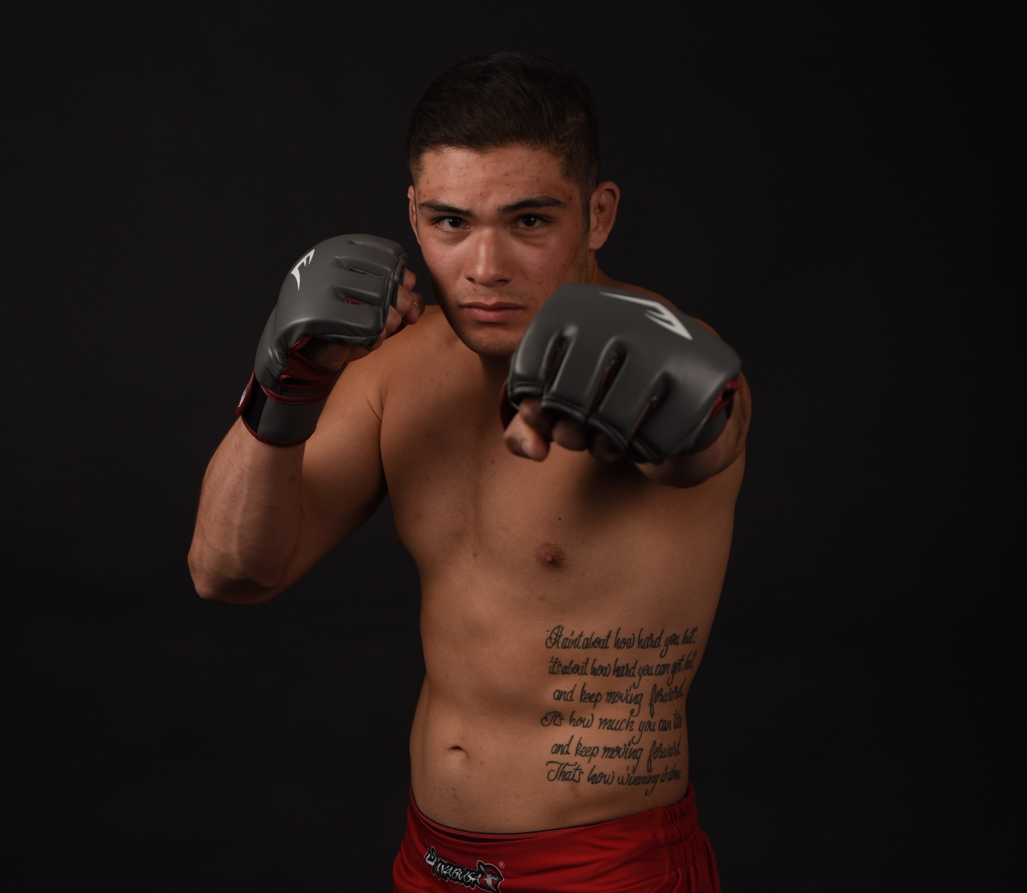 Airman 1st Class Raul Veliz, 90th Missile Security Forces Squadron response force leader, poses for a photo at F.E. Warren Air Force Base, Wyo., May 17, 2017. Veliz fights in the 185 lb. weight class for mixed martial arts. (U.S. Air Force photo by Airman 1st Class Breanna Carter)