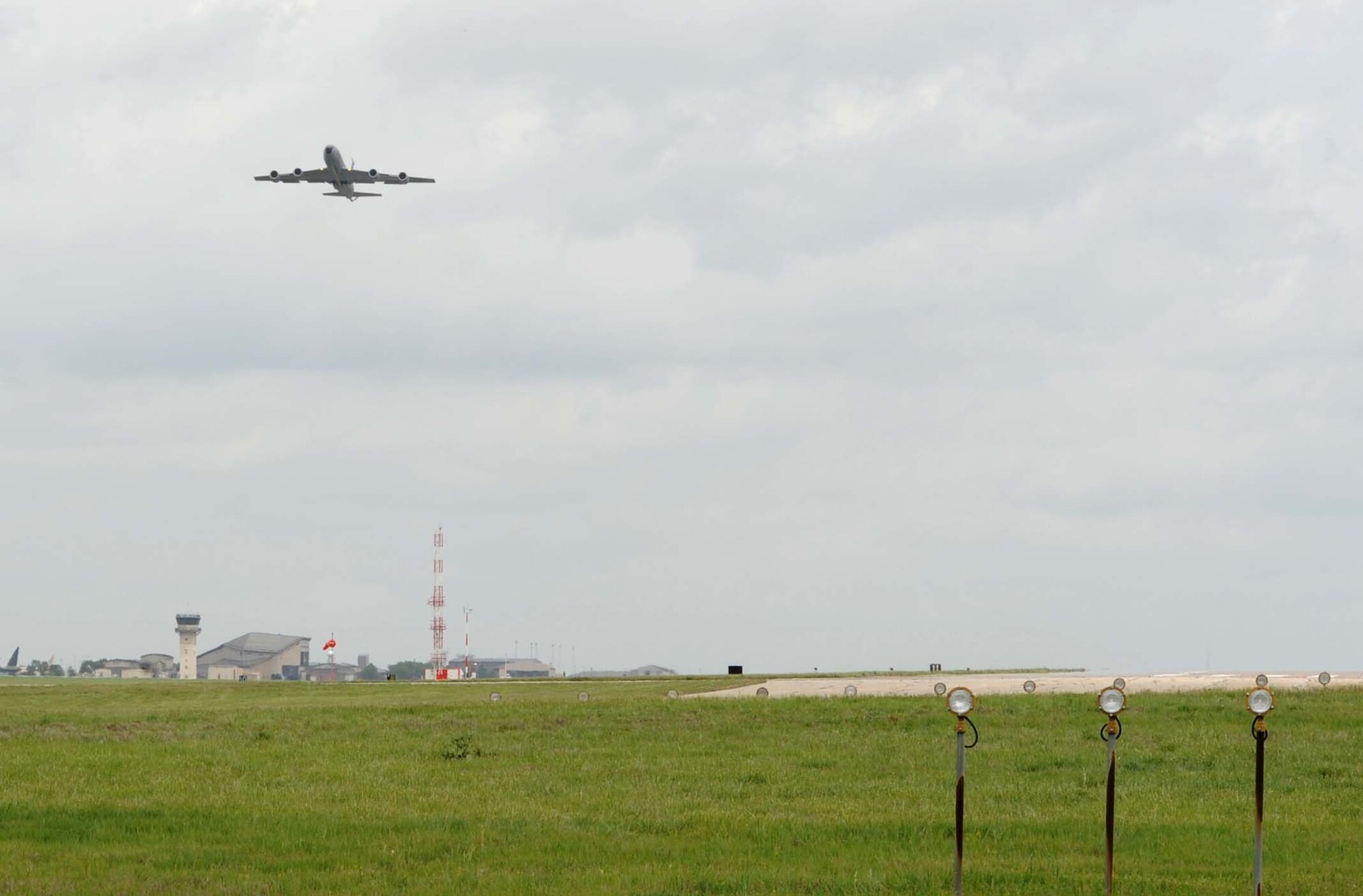 A KC-135 Stratotanker takes flight during an evacuation May 18, 2017, at McConnell Air Force Base, Kan.  The evacuation was completed to keep the aircraft out of the way of potential severe weather. (U.S. Air Force photo/Senior Airman Tara Fadenrecht)