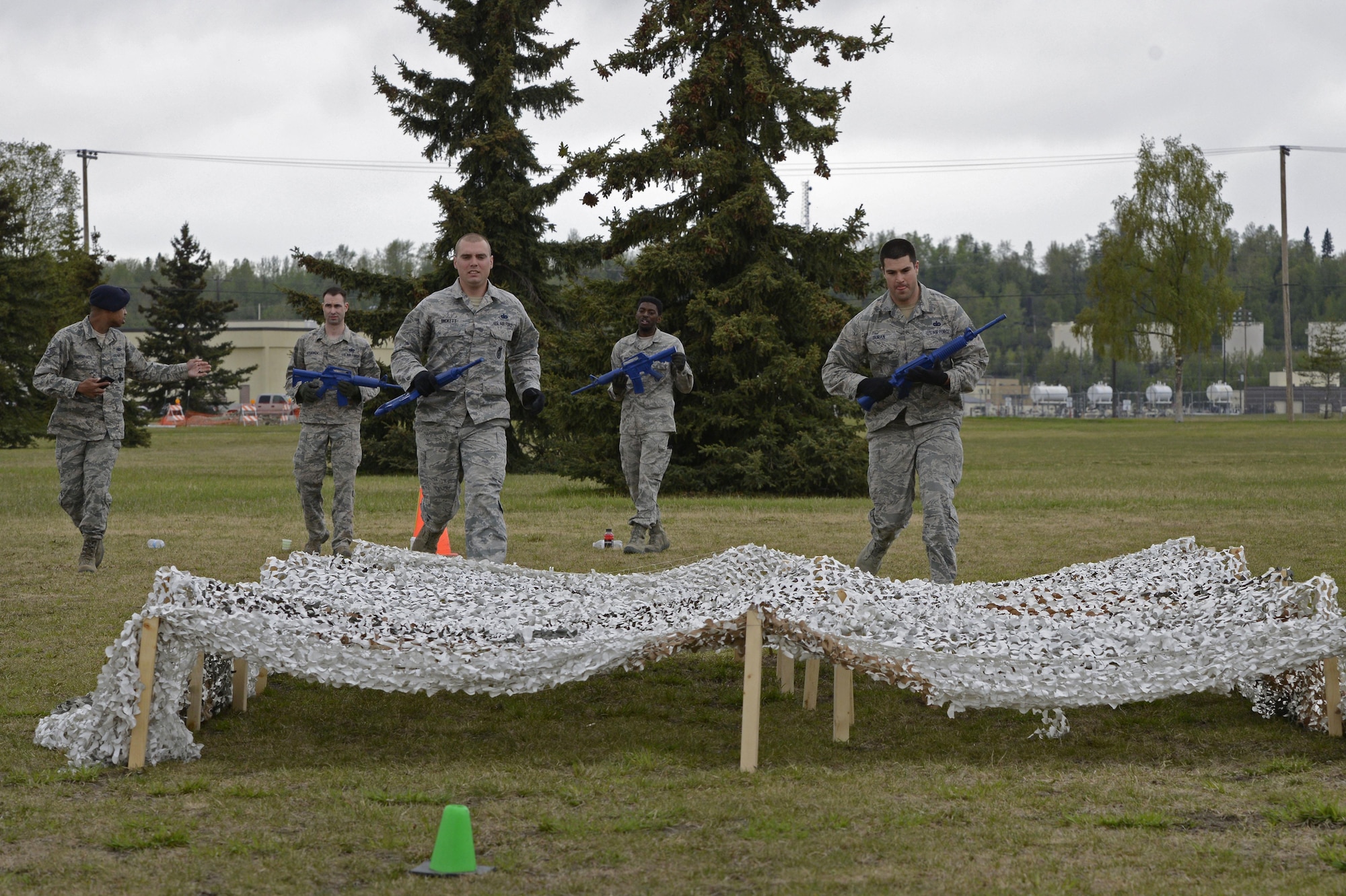 Service members and government contract workers compete during Defender Day Challenge on Joint Base Elmendorf-Richardson, Alaska, May 17, 2017. Defender Day is part of police week which focuses on remembrance of those who have made the ultimate sacrifice in the line of duty. 