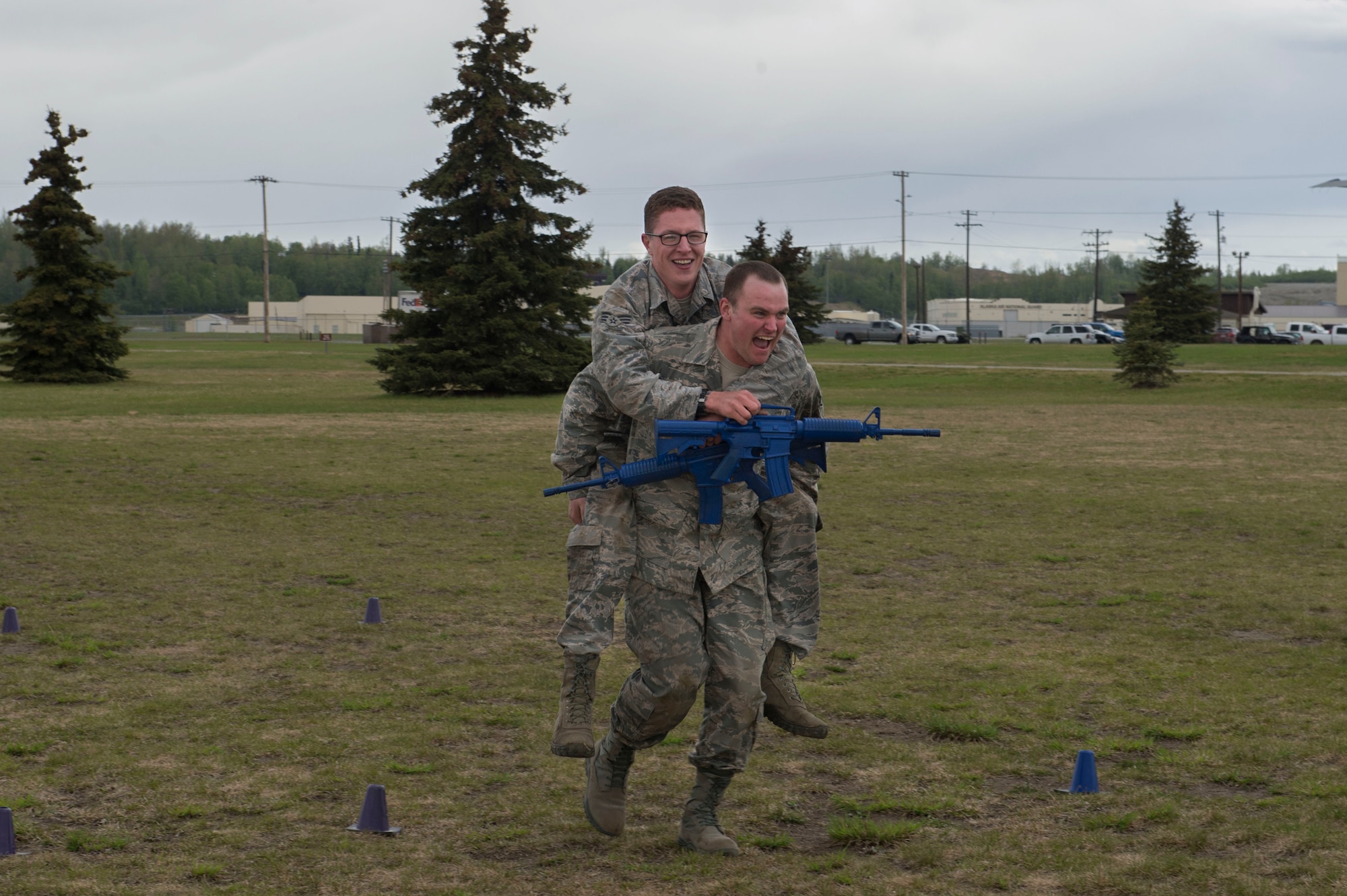 Service members and government contract workers compete during Defender Day Challenge on Joint Base Elmendorf-Richardson, Alaska, May 17, 2017. Defender Day is part of police week which focuses on remembrance of those who have made the ultimate sacrifice in the line of duty. 