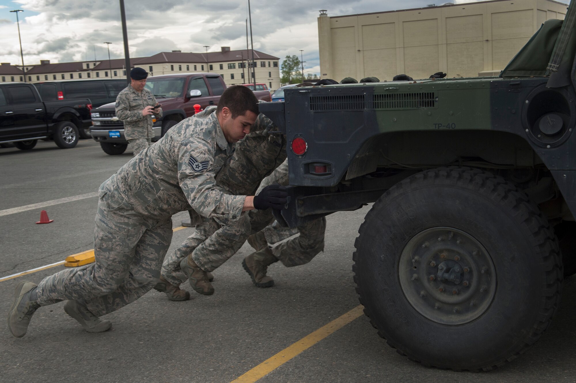 Service members and government contract workers compete during Defender Day Challenge on Joint Base Elmendorf-Richardson, Alaska, May 17, 2017. Defender Day is part of police week which focuses on remembrance of those who have made the ultimate sacrifice in the line of duty. 