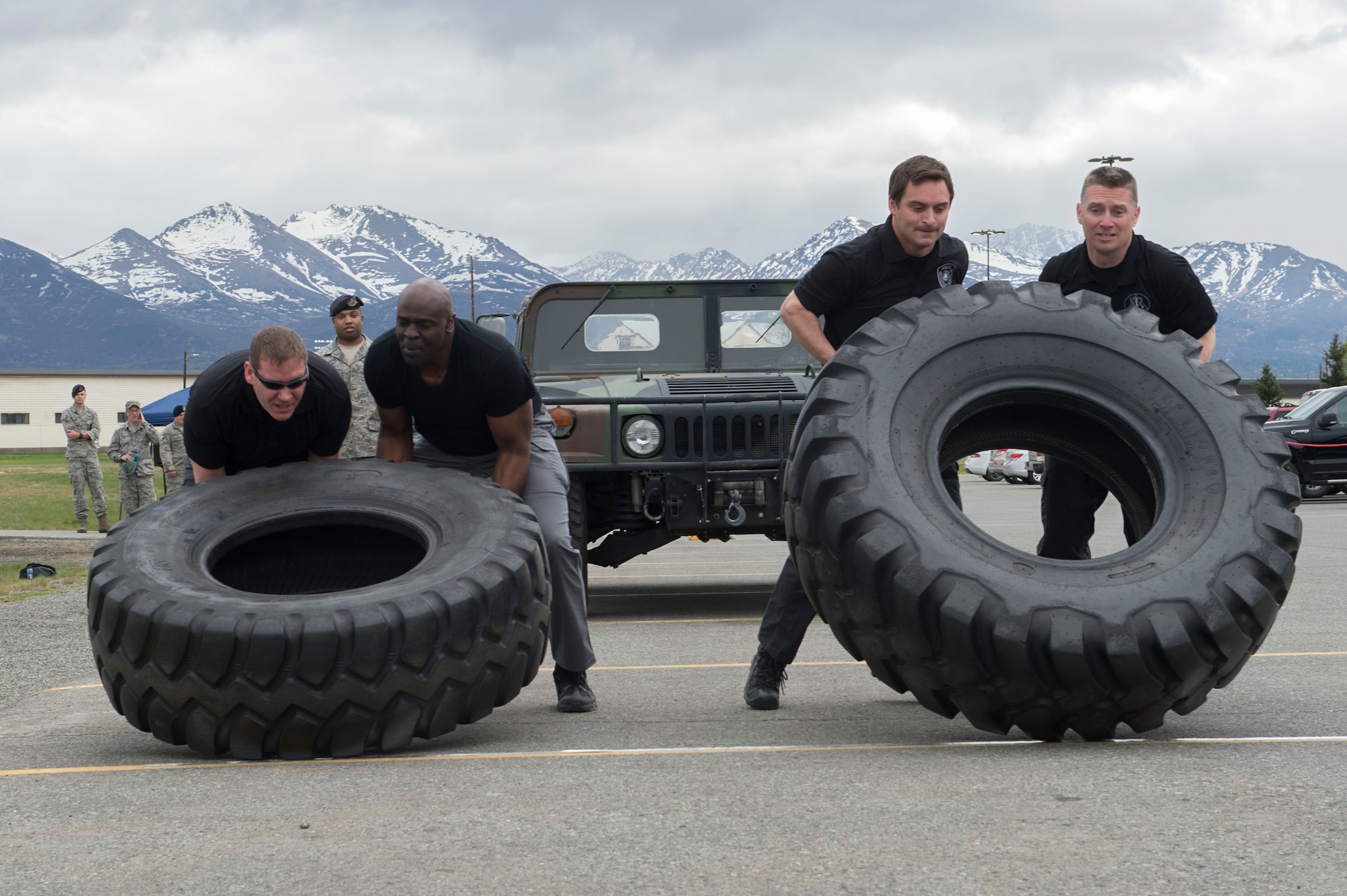Service members and government contract workers compete during Defender Day Challenge on Joint Base Elmendorf-Richardson, Alaska, May 17, 2017. Defender Day is part of police week which focuses on remembrance of those who have made the ultimate sacrifice in the line of duty. 